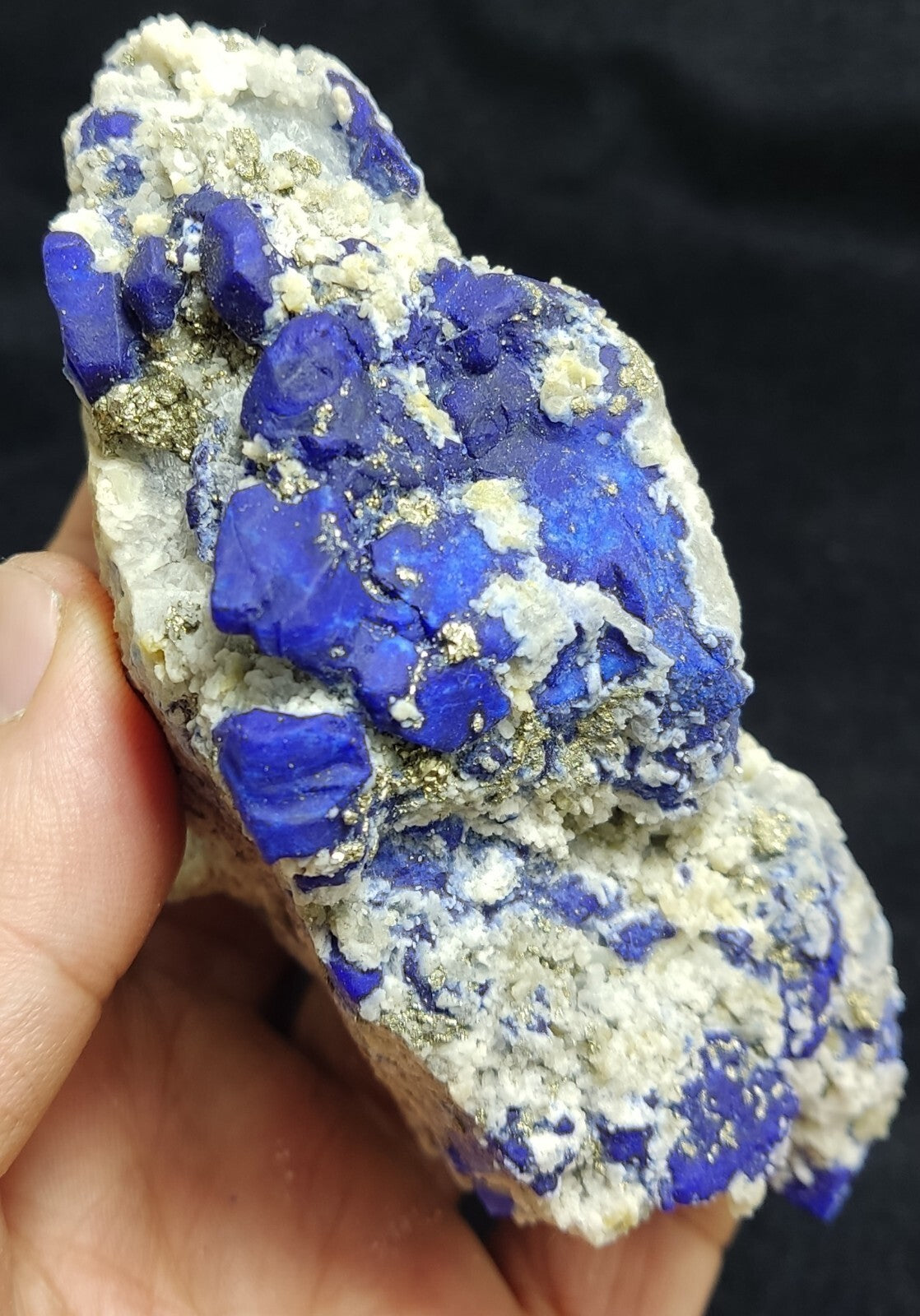 An Aesthetic specimen of fluorescent Lazurite with pyrite 489 grams