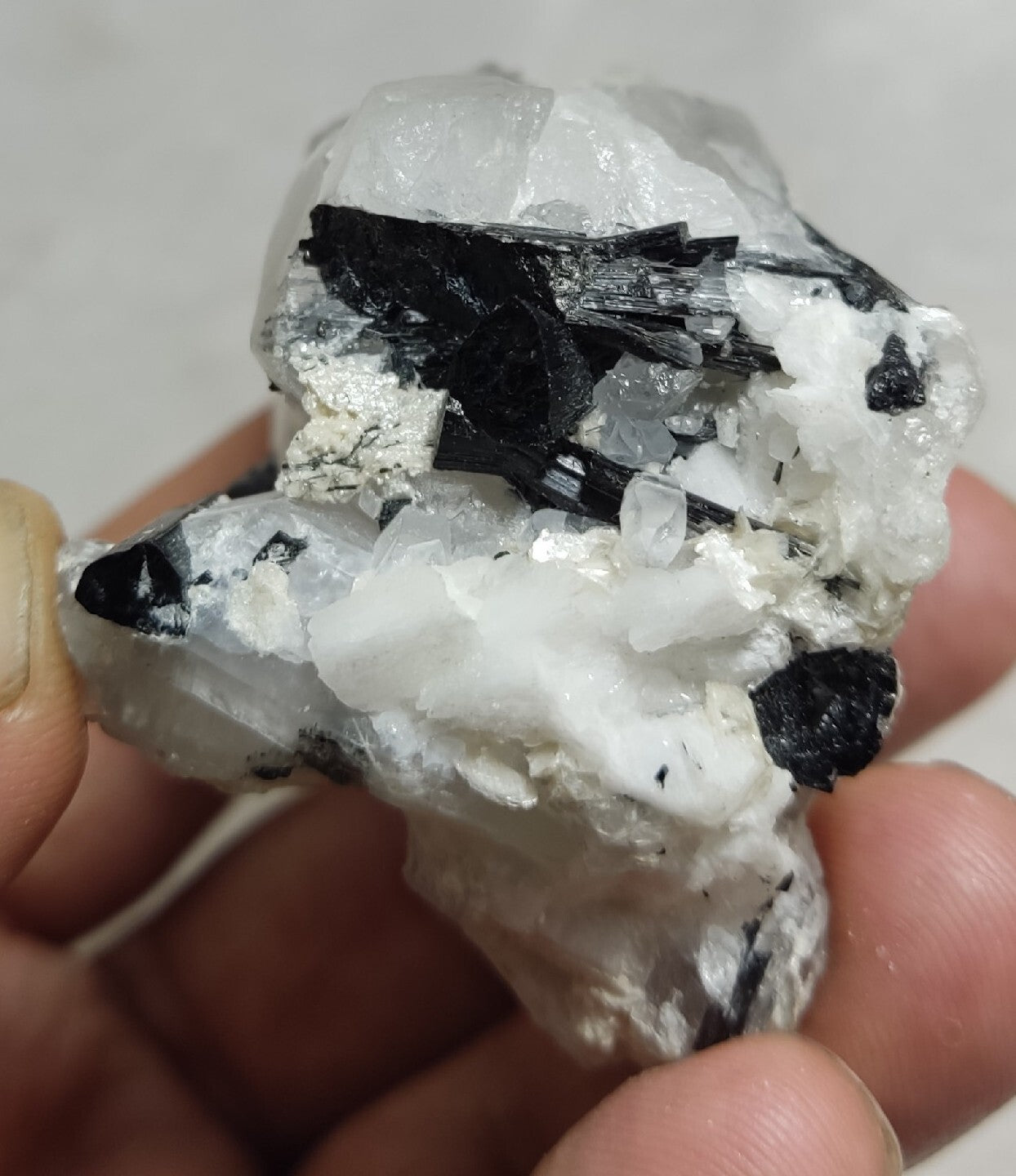 Natural quartz crystal with black tourmaline 145 grams