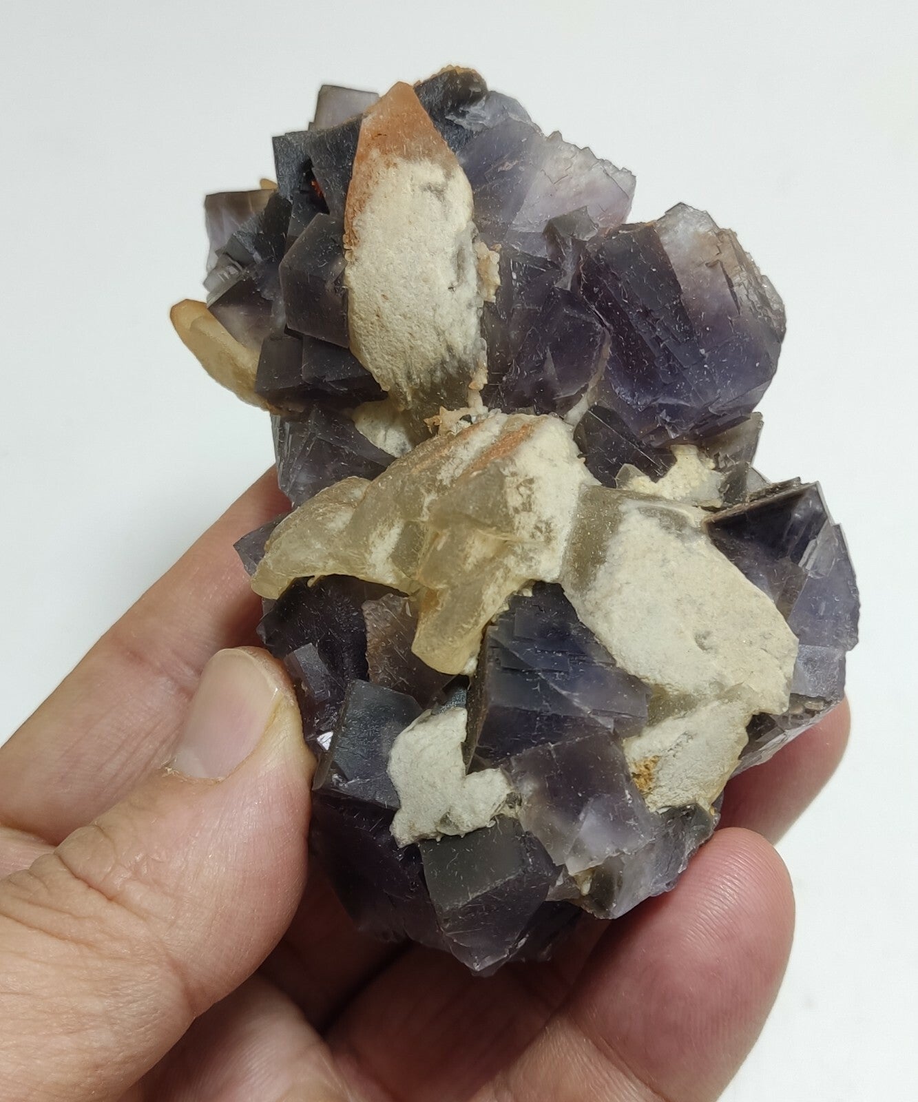An amazing specimen of cubic purplish color Fluorite with calcite 263 grams