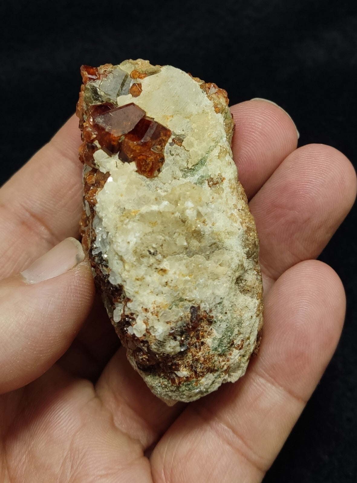 An Aesthetic specimen of hessonite garnets on matrix 132 grams