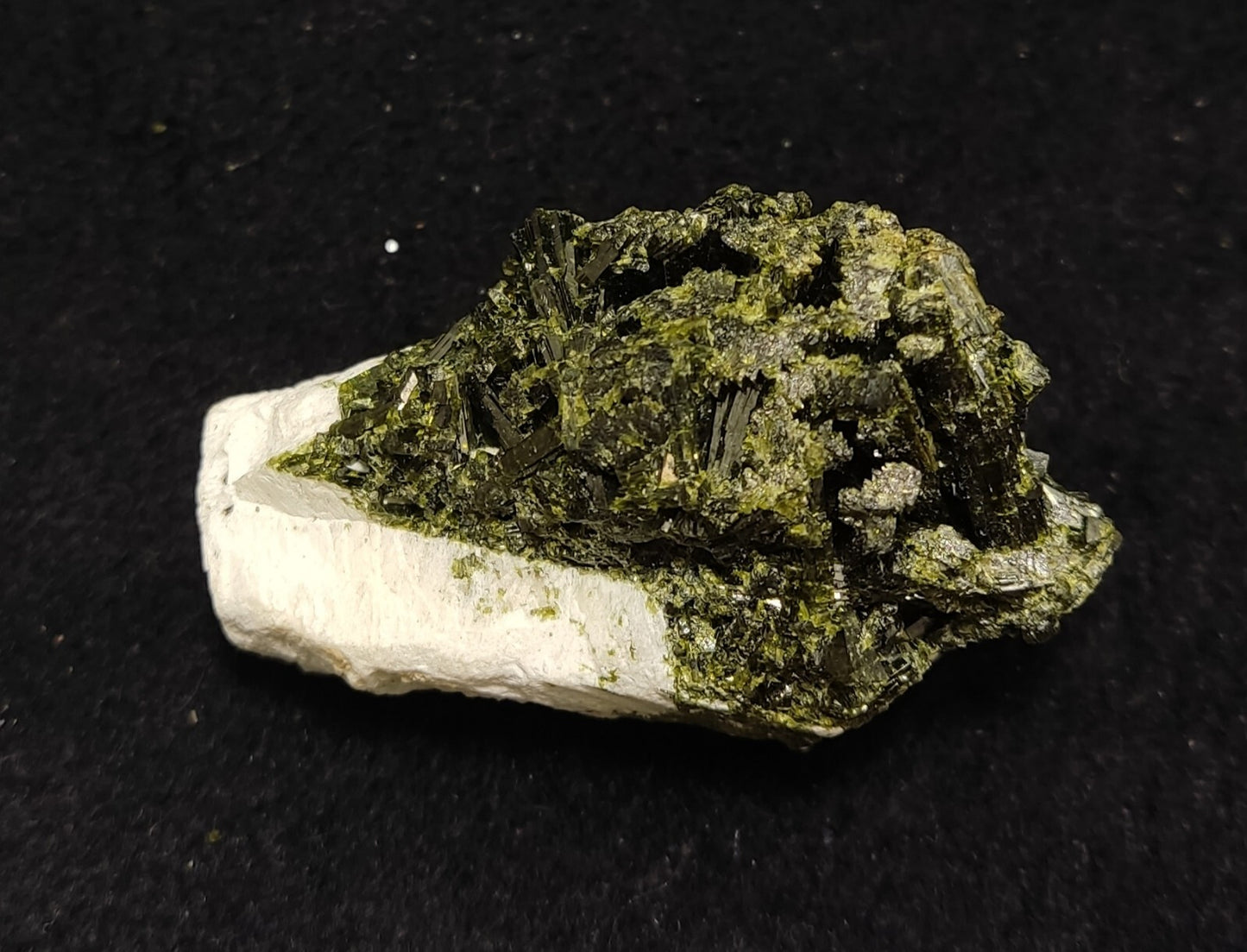 An Aesthetic specimen of epidote in matrix with andradite garnet 55 grams