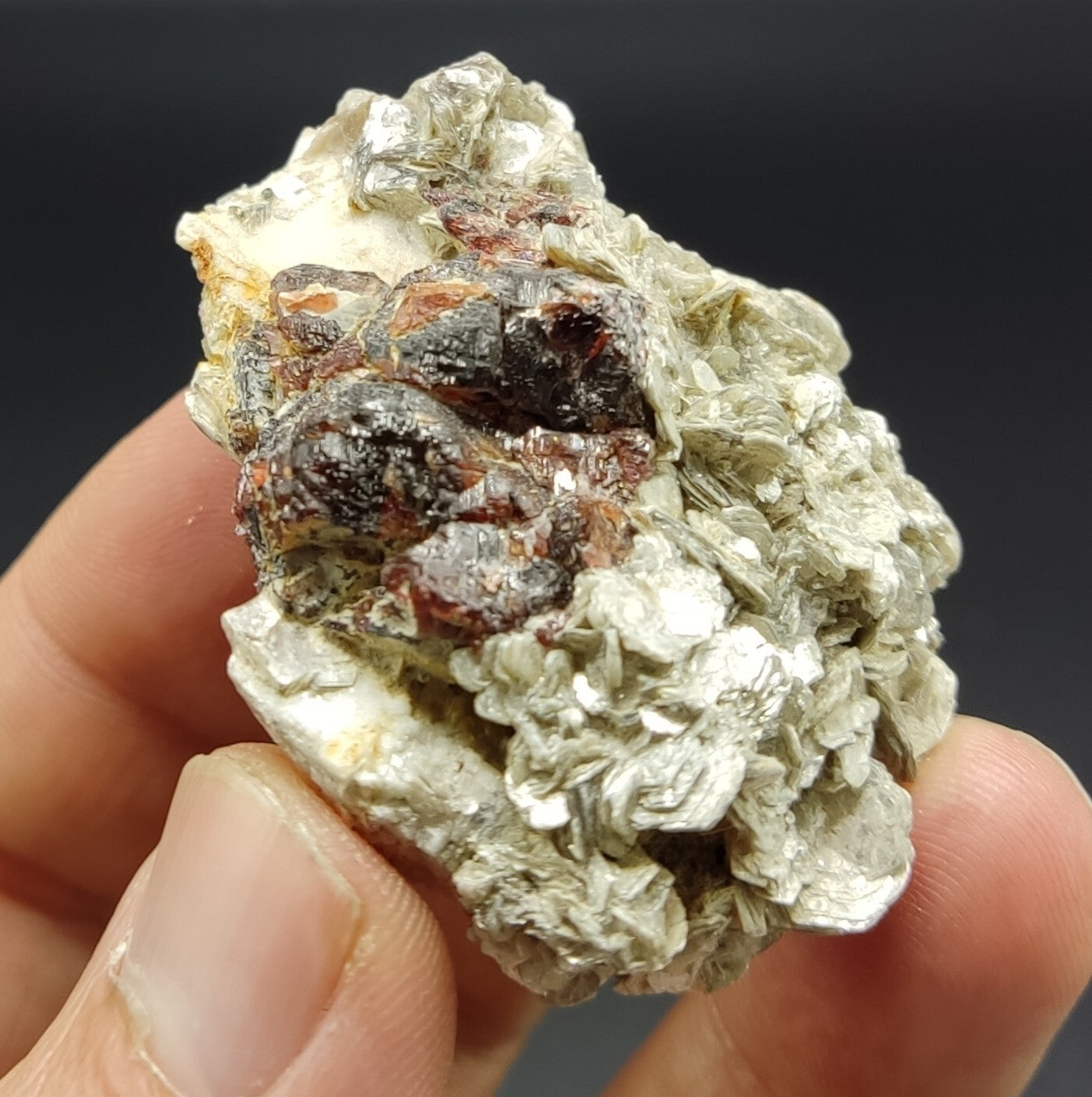 An aesthetic specimen of spessartine garnets on muscovite 58 grams