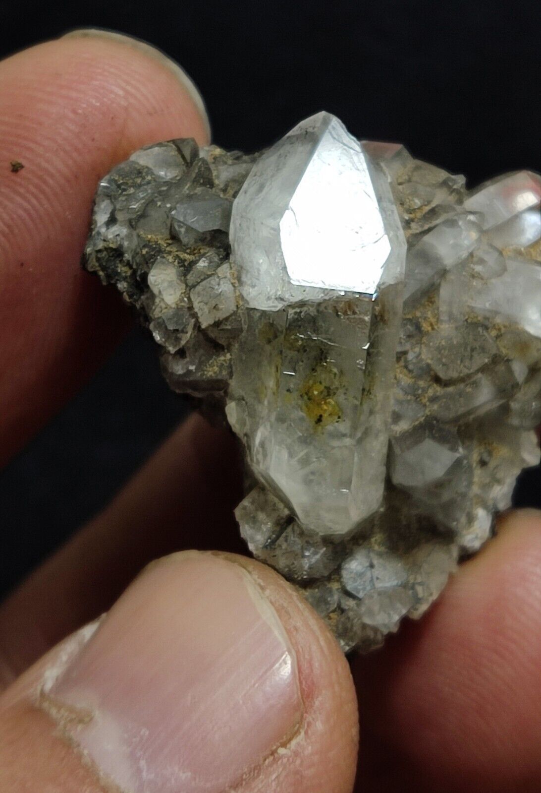 An Aesthetic quartz/calcite crystal specimen with petroleum inclusions 15 grams