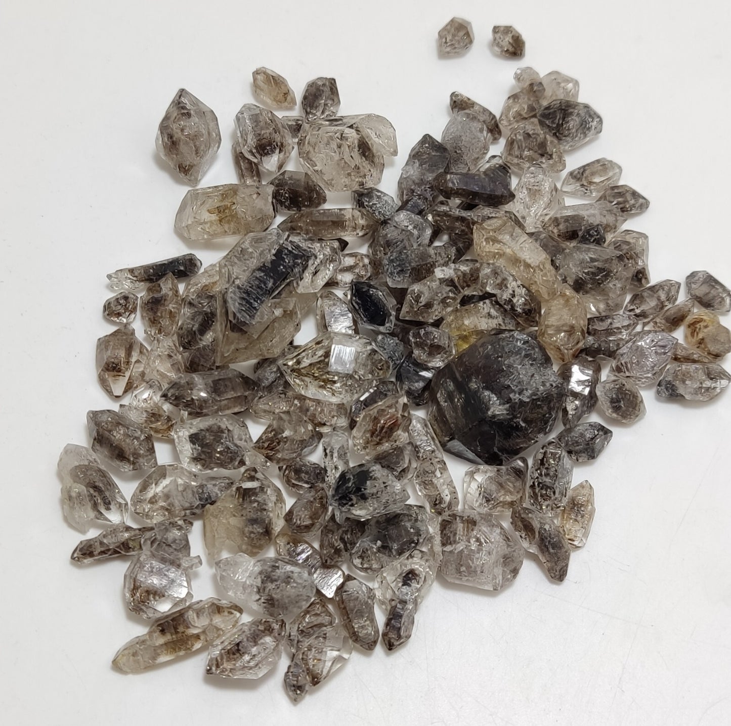 105 grams carbon included quartz crystals
