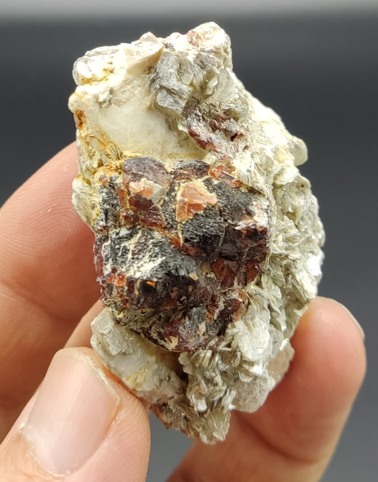 An aesthetic specimen of spessartine garnets on muscovite 58 grams
