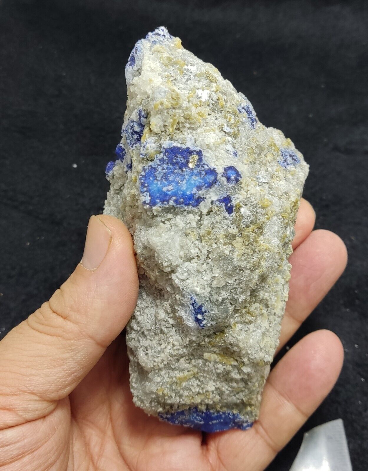 An Aesthetic specimen of fluorescent Lazurite with pyrite 415 grams