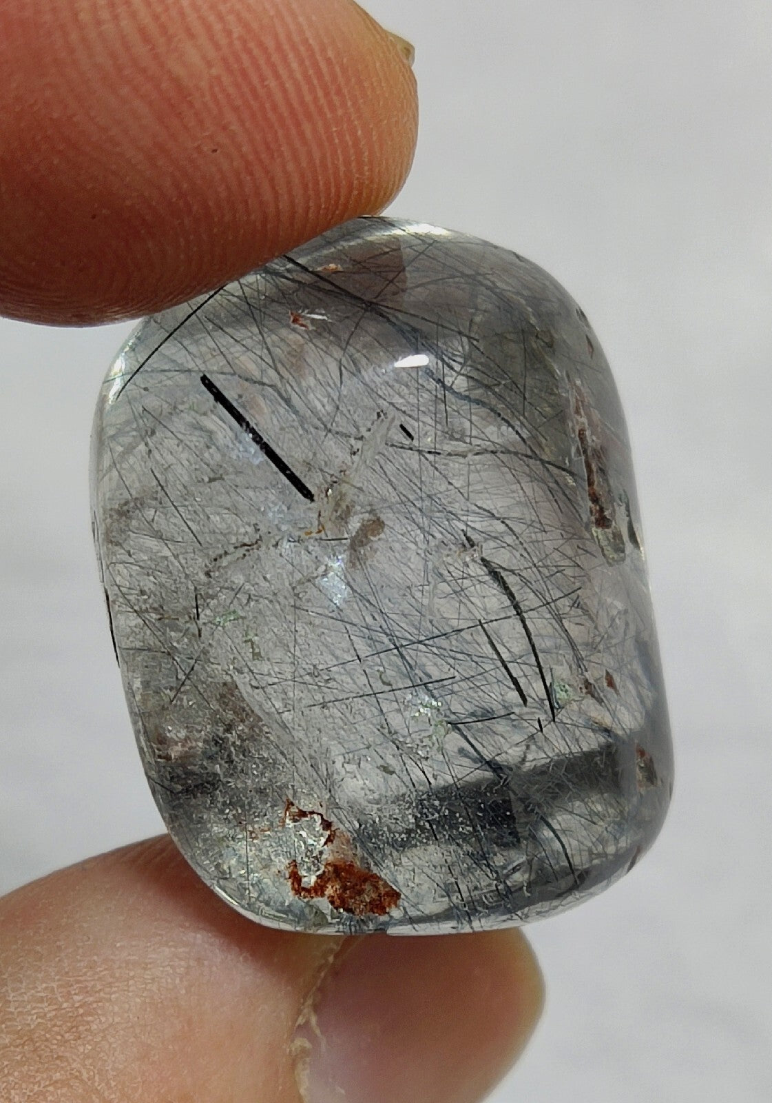 Single piece Rutiles/riebeckite/aegirine included quartz tumble 94 carats