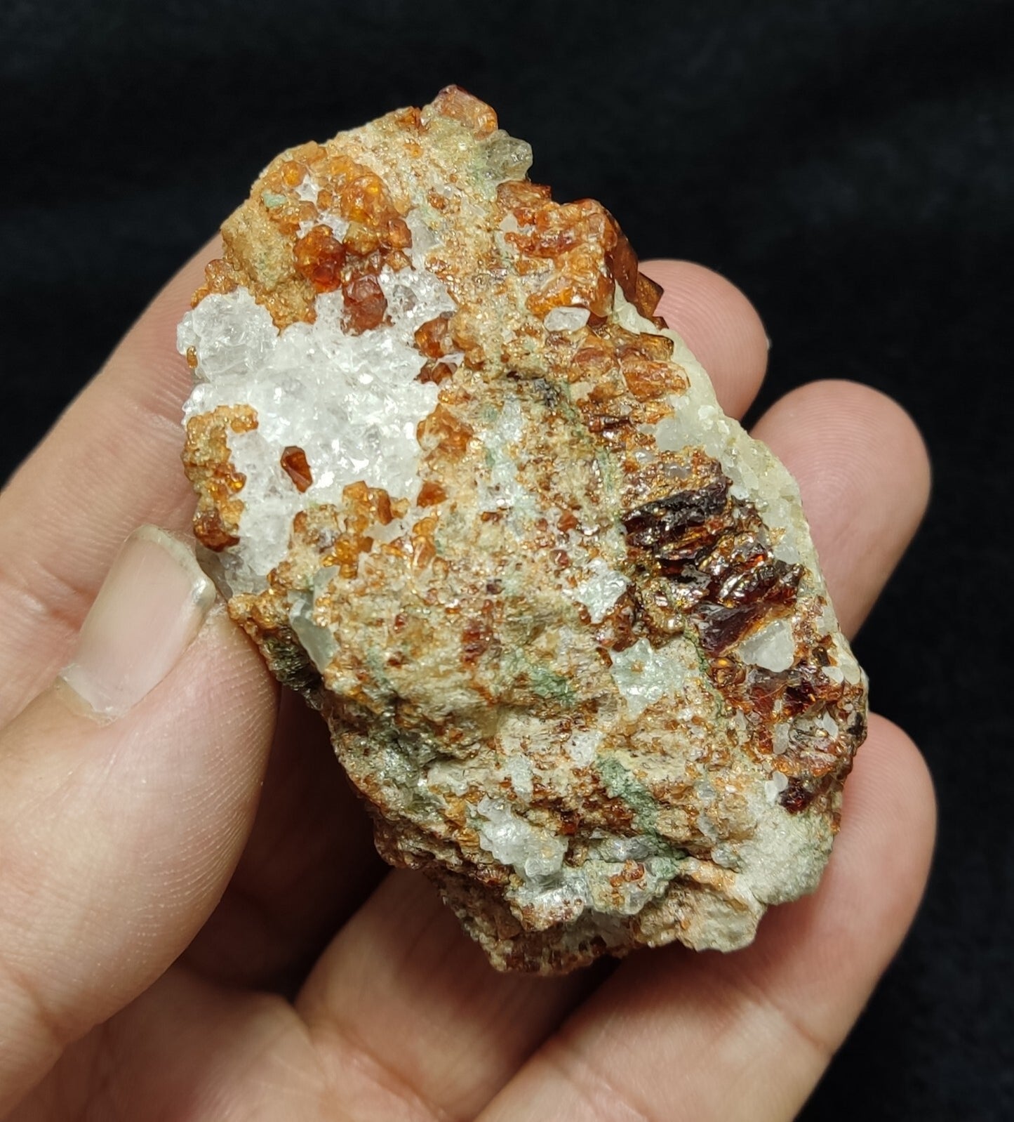 An Aesthetic specimen of hessonite garnets on matrix 132 grams