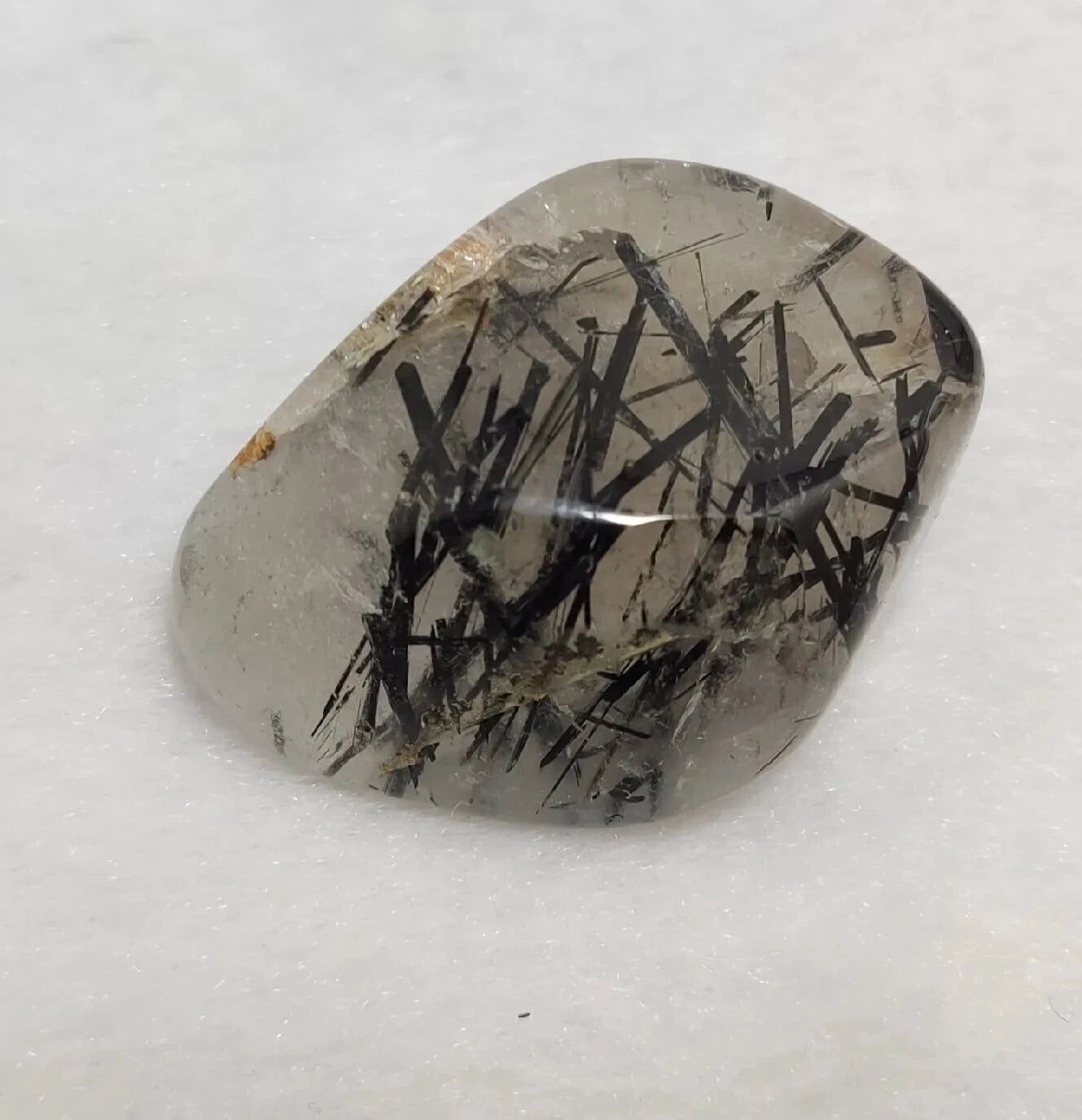 Rutiles/aegirine/ Unconfirmed quartz polished tumble 75 carats