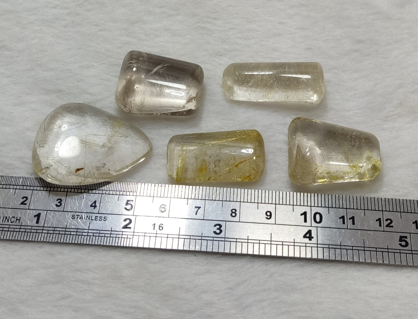 An amazing lot of Rutilated polished quartz tumbles 53 grams