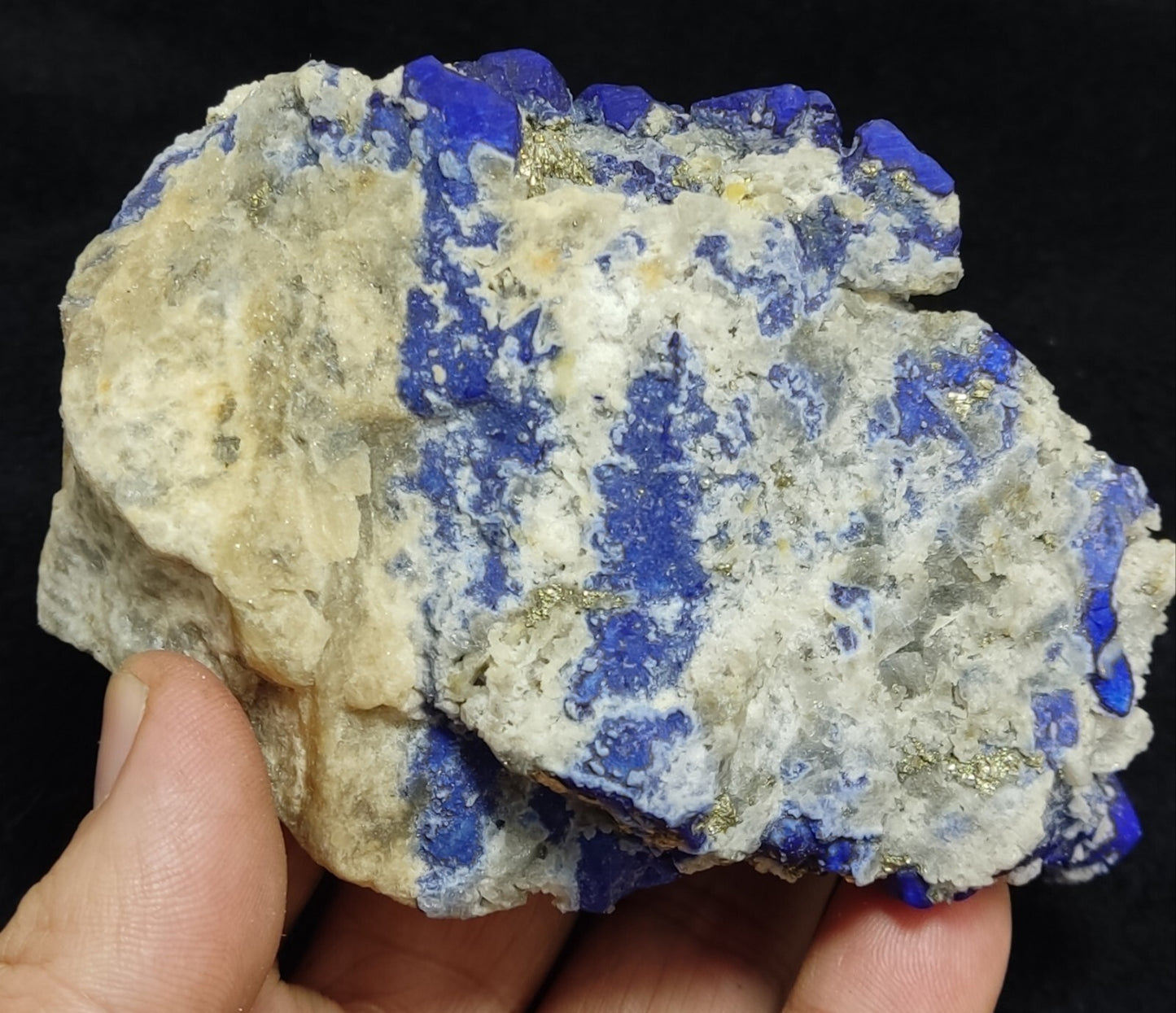 An Aesthetic specimen of fluorescent Lazurite with pyrite 489 grams