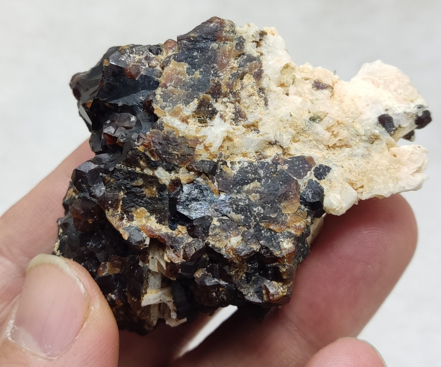 An Aesthetic specimen of andradite garnets on matrix 120 grams