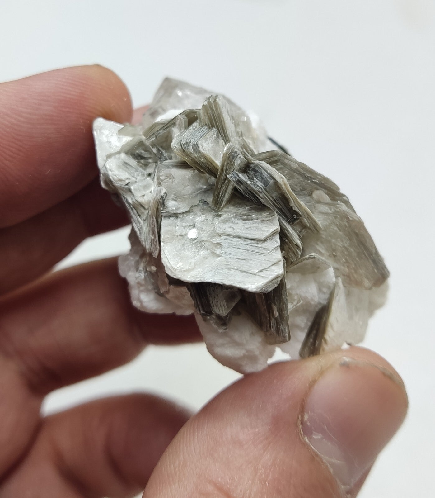 An Aesthetic specimen of muscovite with quartz, Tourmaline and albite 49 grams
