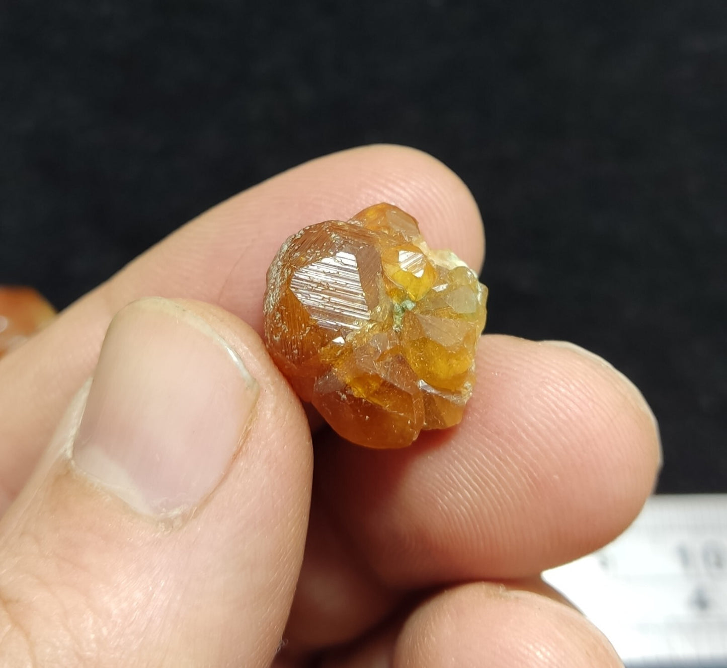 A selection of three garnet variety hessonite crystals 14.8 grams