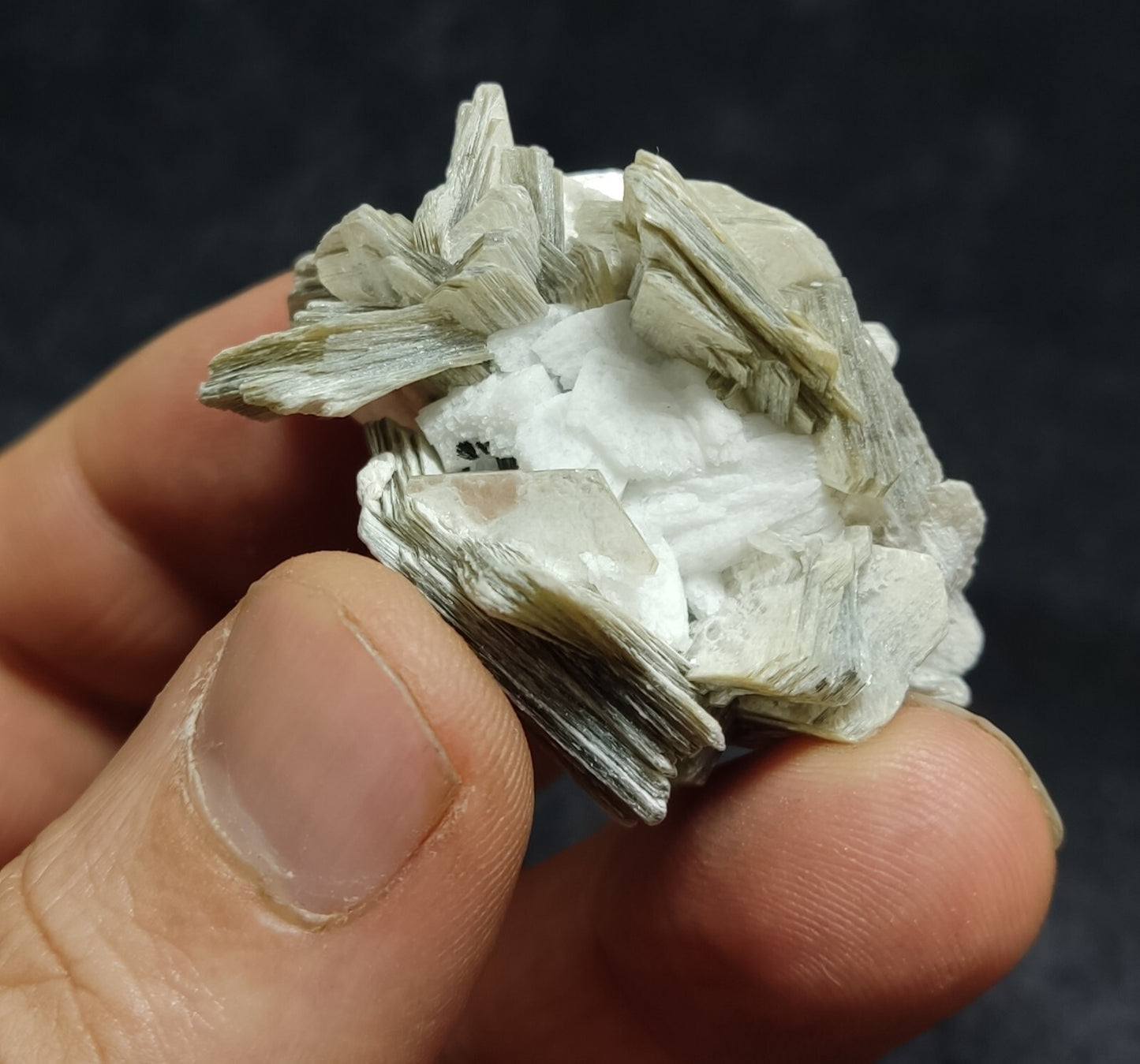 An Aesthetic specimen of muscovite with Tourmaline and albite 27 grams