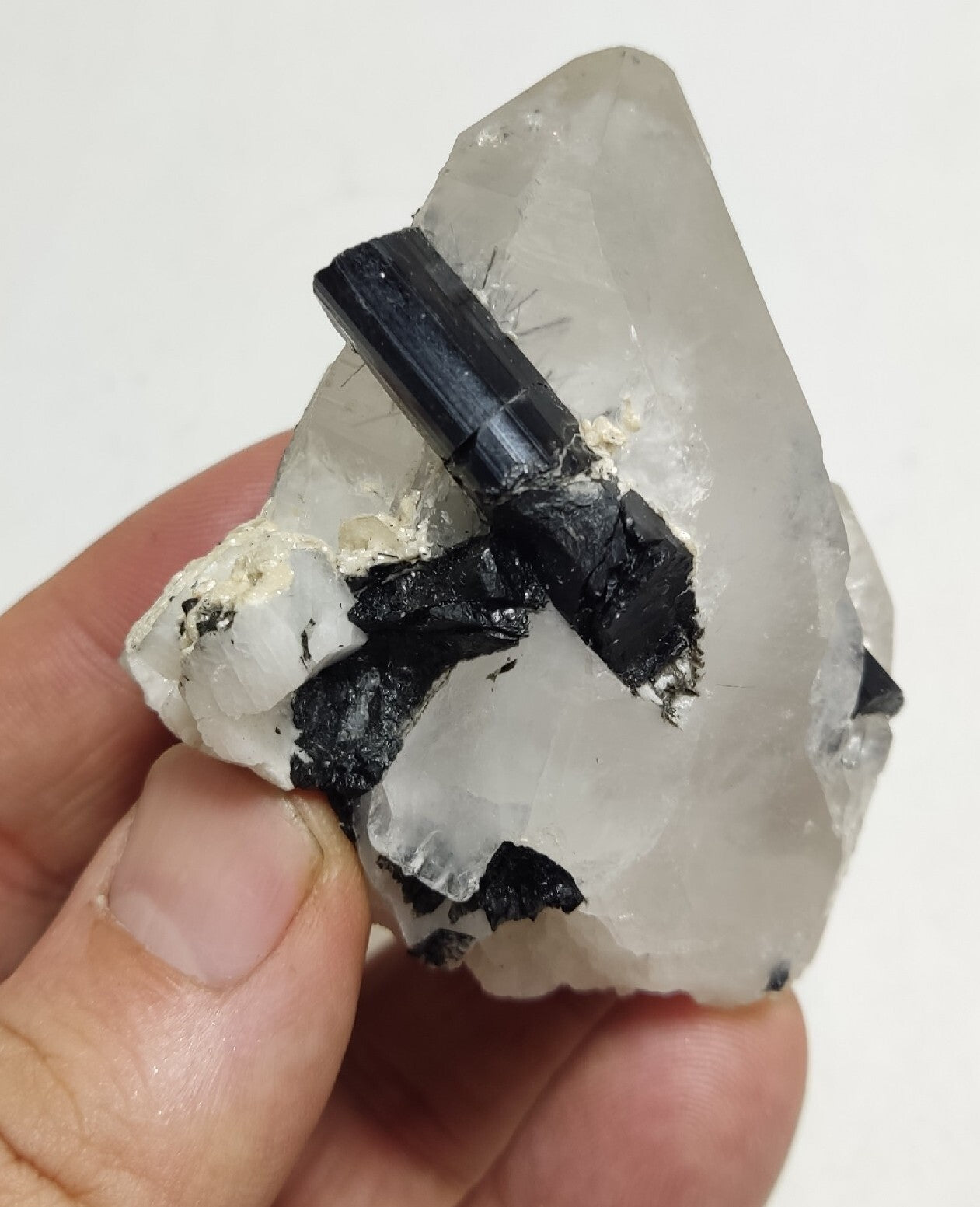 Natural quartz crystal with black tourmaline 129 grams