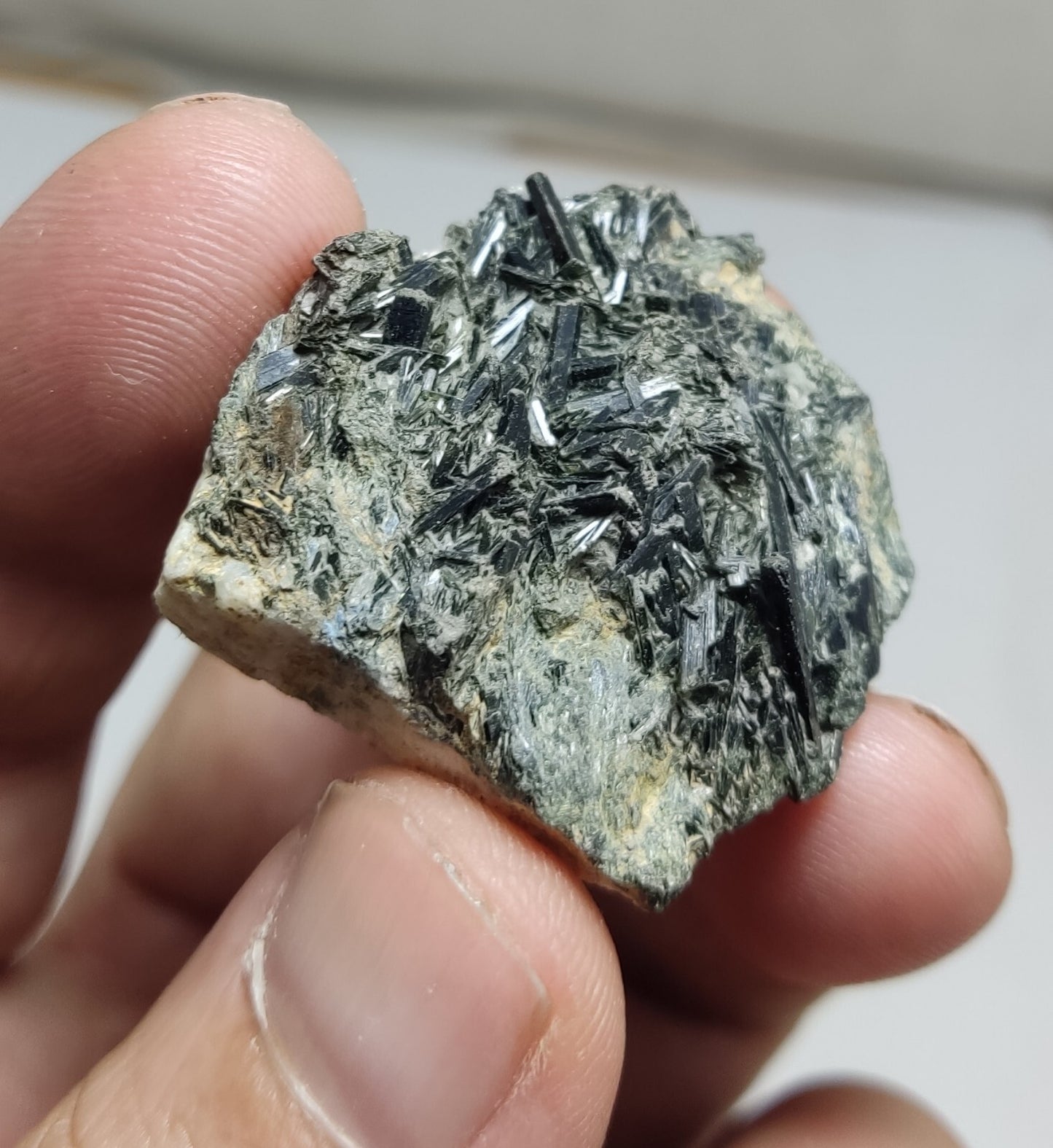 An aesthetic specimen of terminated aegirine crystals on matrix 26 grams