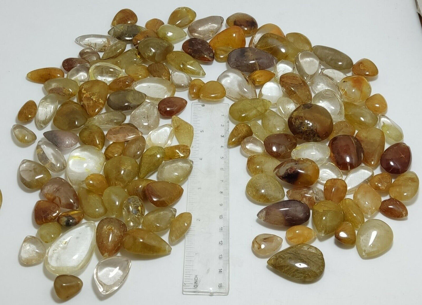 780 grams Rutilated polished quartz tumbles-cabochons