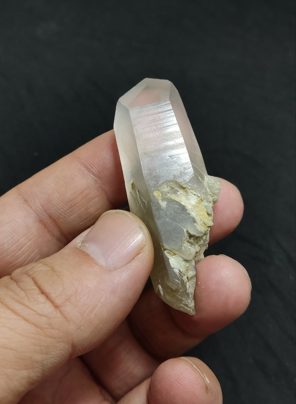 An amazing specimen of terminated Quartz crystal with unique inclusions 30 grams