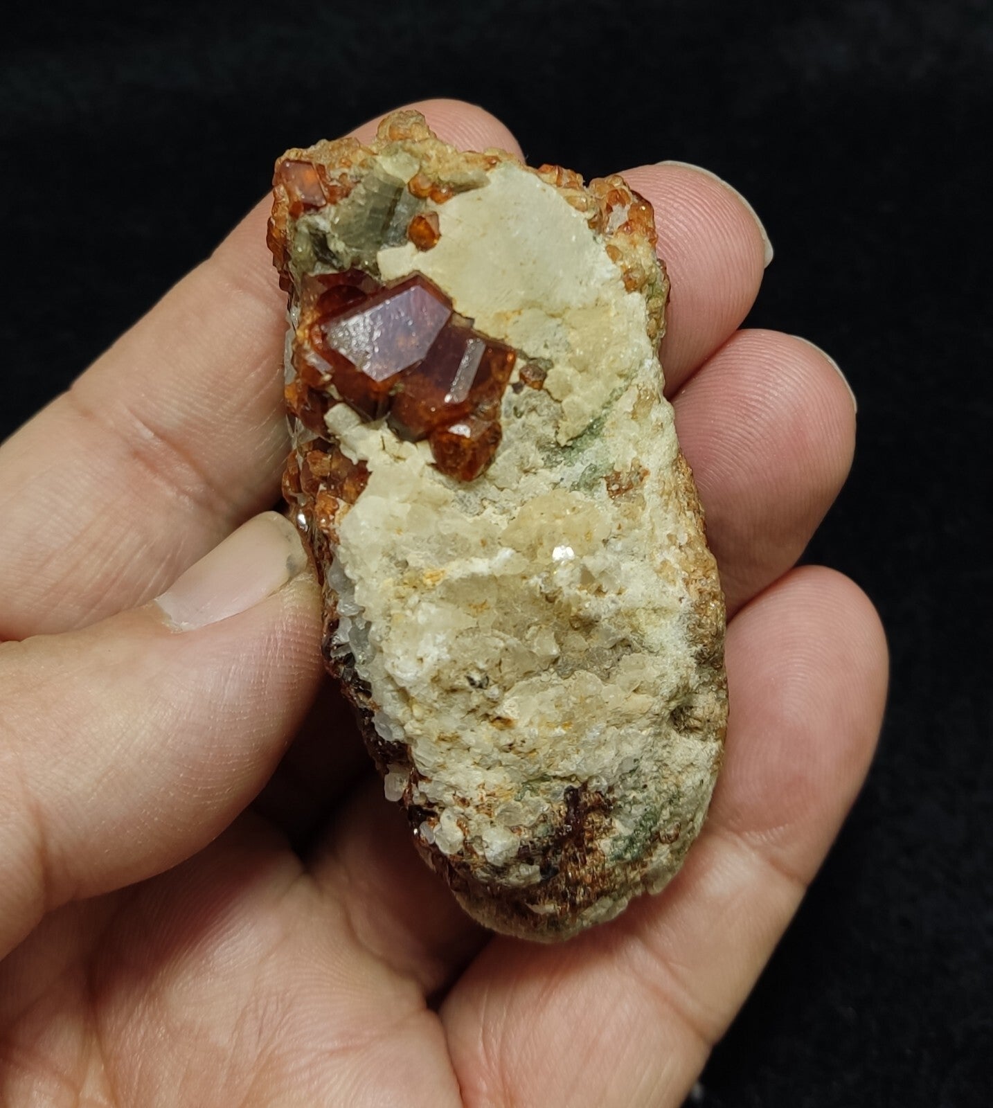 An Aesthetic specimen of hessonite garnets on matrix 132 grams
