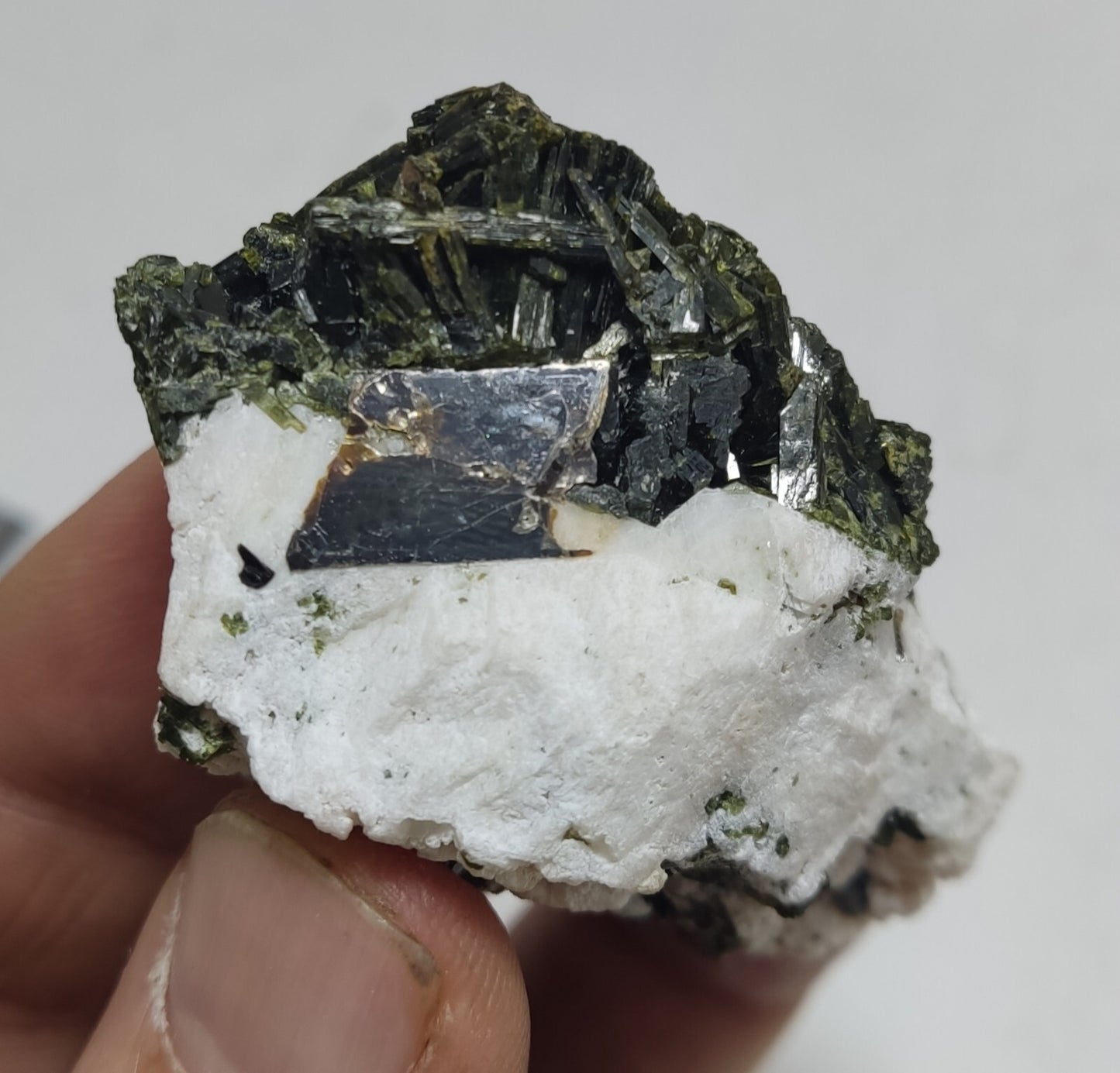 An Aesthetic specimen of epidote in matrix with andradite garnet 55 grams