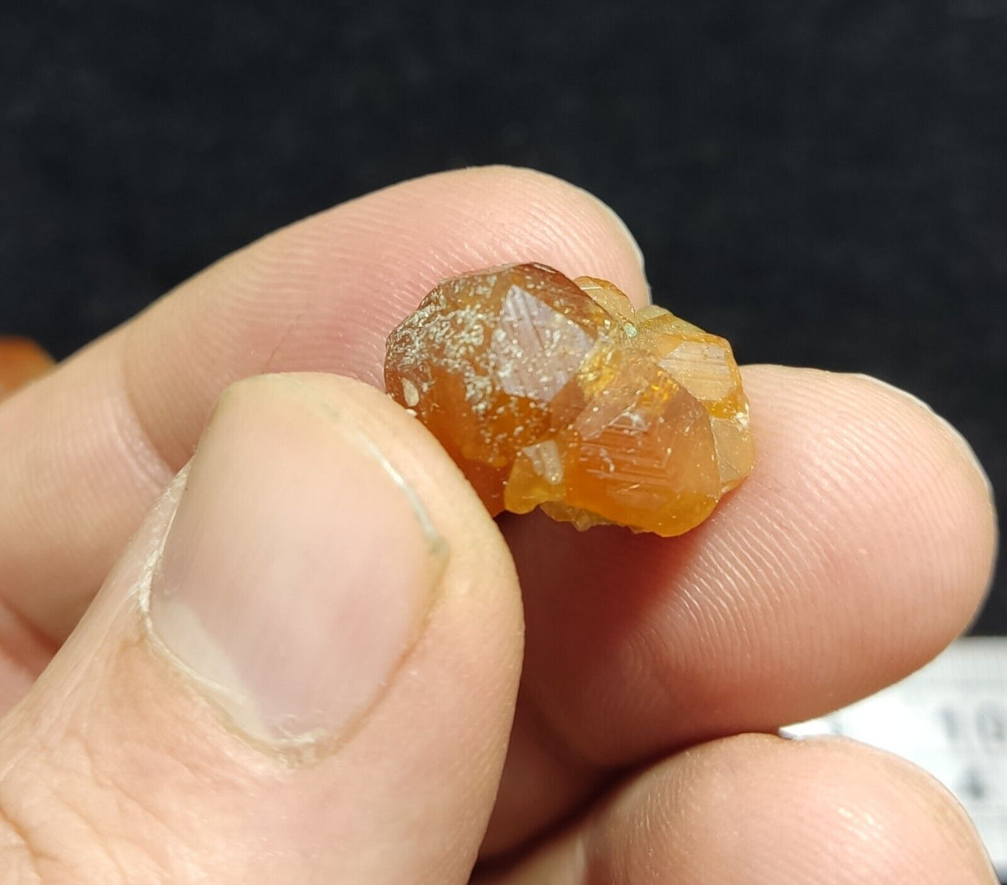 A selection of three garnet variety hessonite crystals 14.8 grams