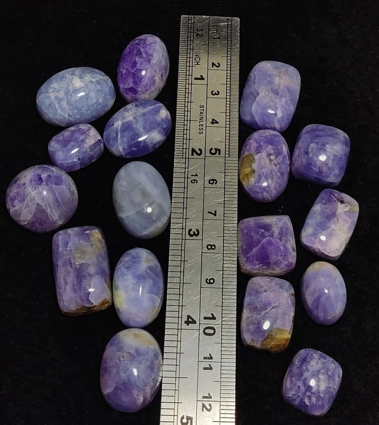 17 pieces Hackmanite cabochons  fluorescent collective weight 350 carats