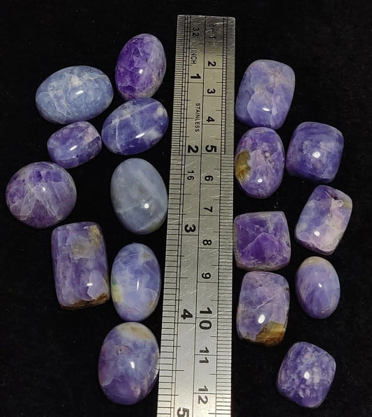 17 pieces Hackmanite cabochons  fluorescent collective weight 350 carats