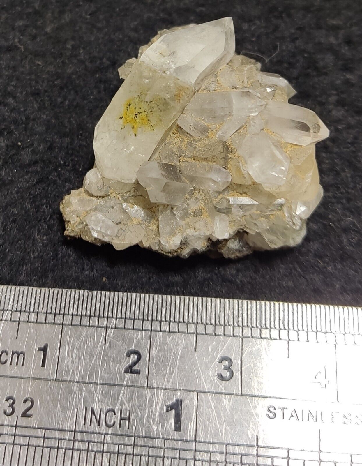An Aesthetic quartz/calcite crystal specimen with petroleum inclusions 15 grams