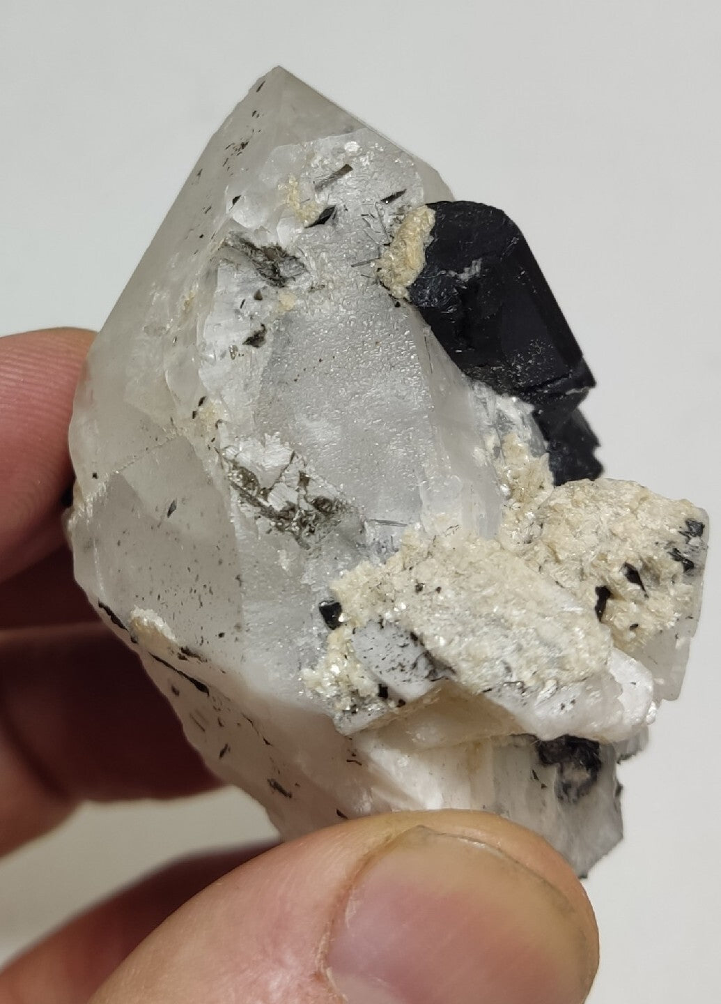 Natural quartz crystal with black tourmaline 129 grams