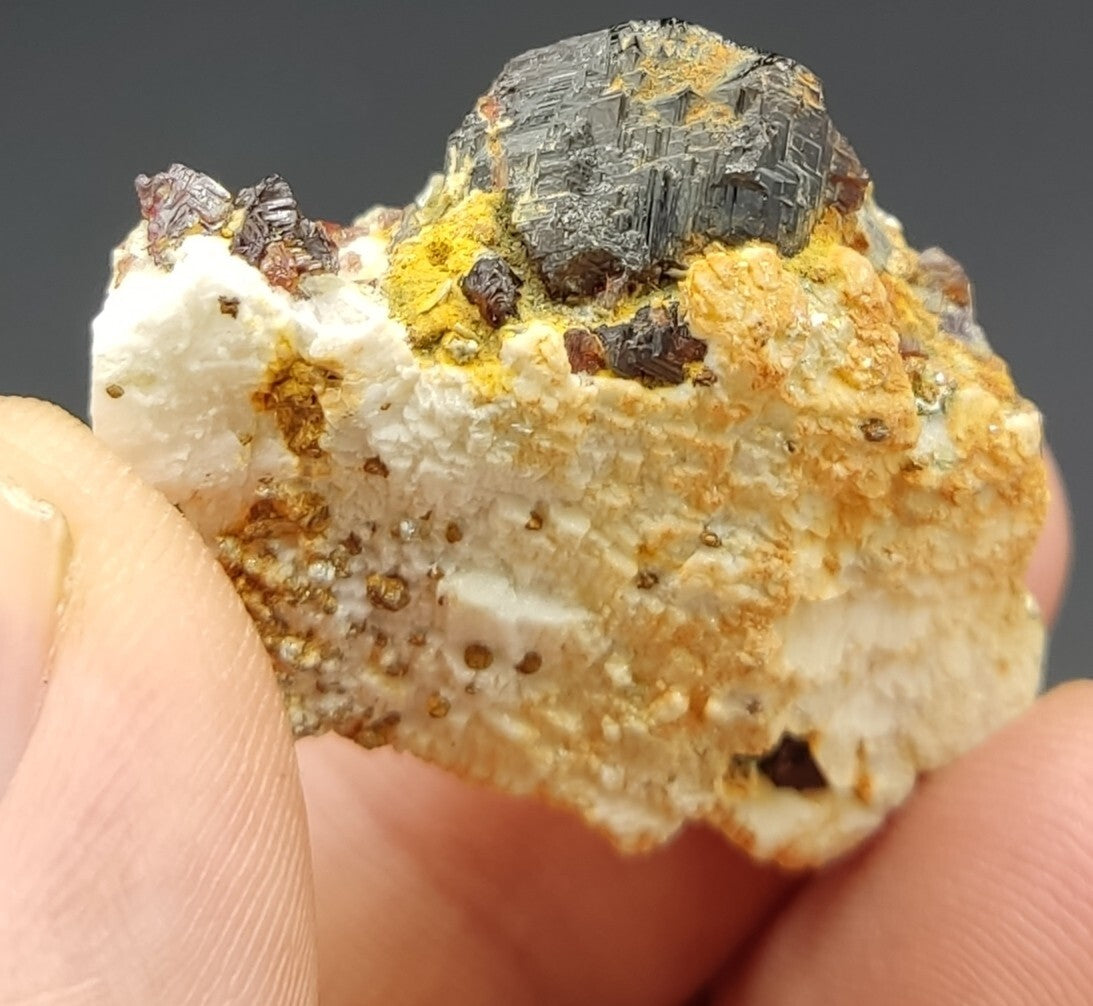 An aesthetic specimen of spessartine garnets on albite/feldspar 15 grams