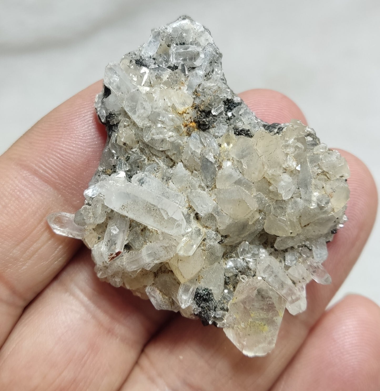 An Aesthetic quartz/calcite crystal specimen with petroleum inclusions 28 grams