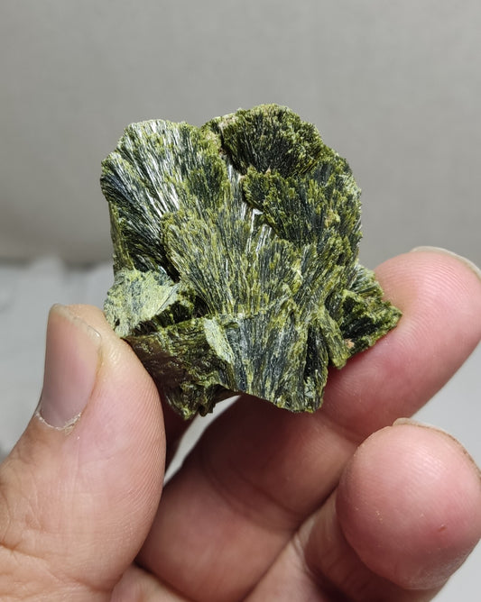 An aesthetic specimen of epidote crystal spray type 31 grams