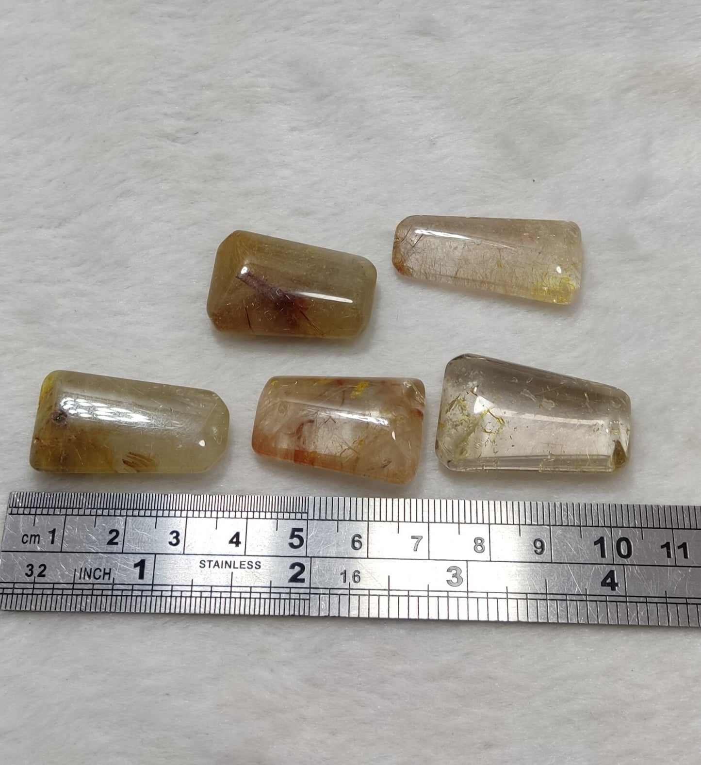 An amazing lot of Rutilated polished quartz tumbles 48 grams