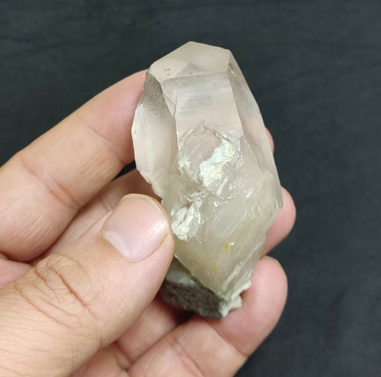 An amazing specimen of terminated Quartz crystal with unique inclusions 97 grams