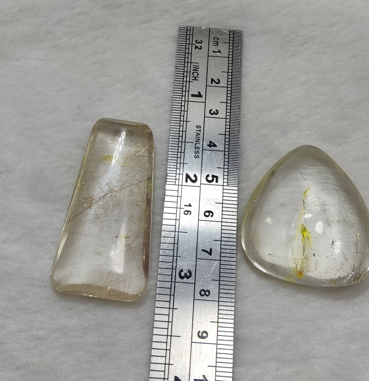 An amazing collection of 2 Rutilated polished quartz tumbles 46 grams