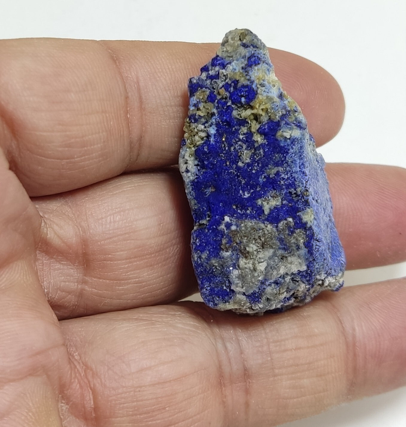 An Aesthetic specimen of fluorescent Lazurite with pyrite 27 grams