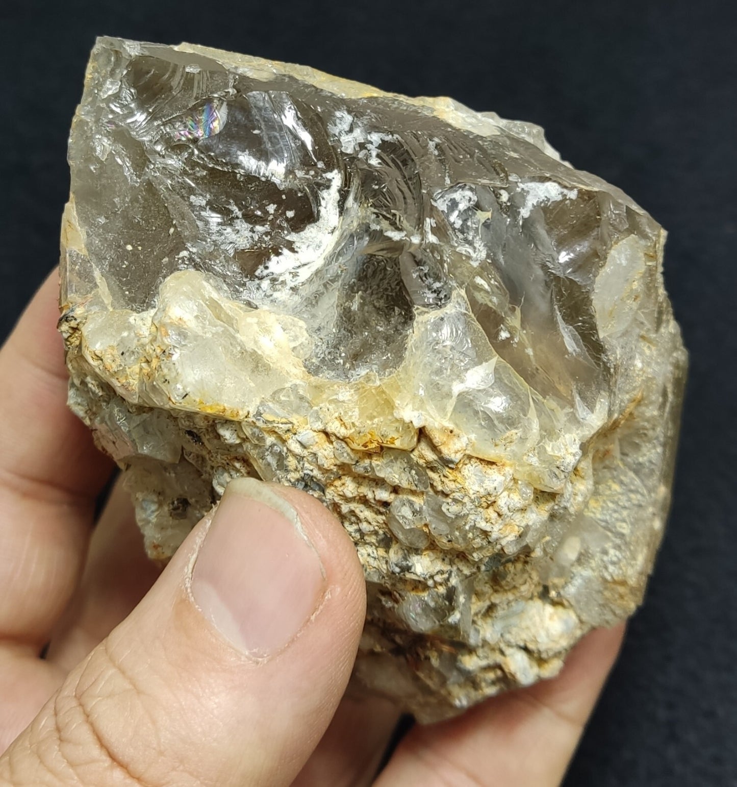 An Aesthetic terminated Quartz floater with rutiles and hematite 399 grams