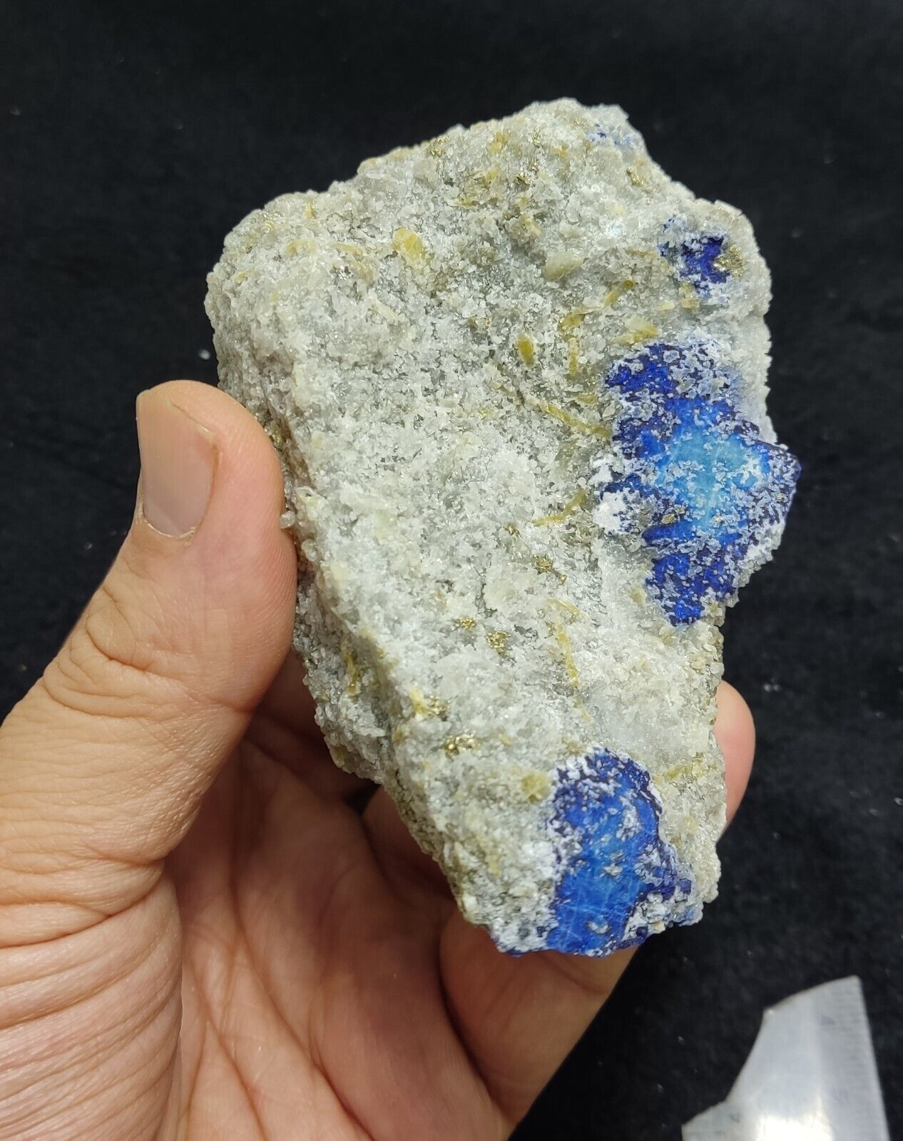 An Aesthetic specimen of fluorescent Lazurite with pyrite 415 grams