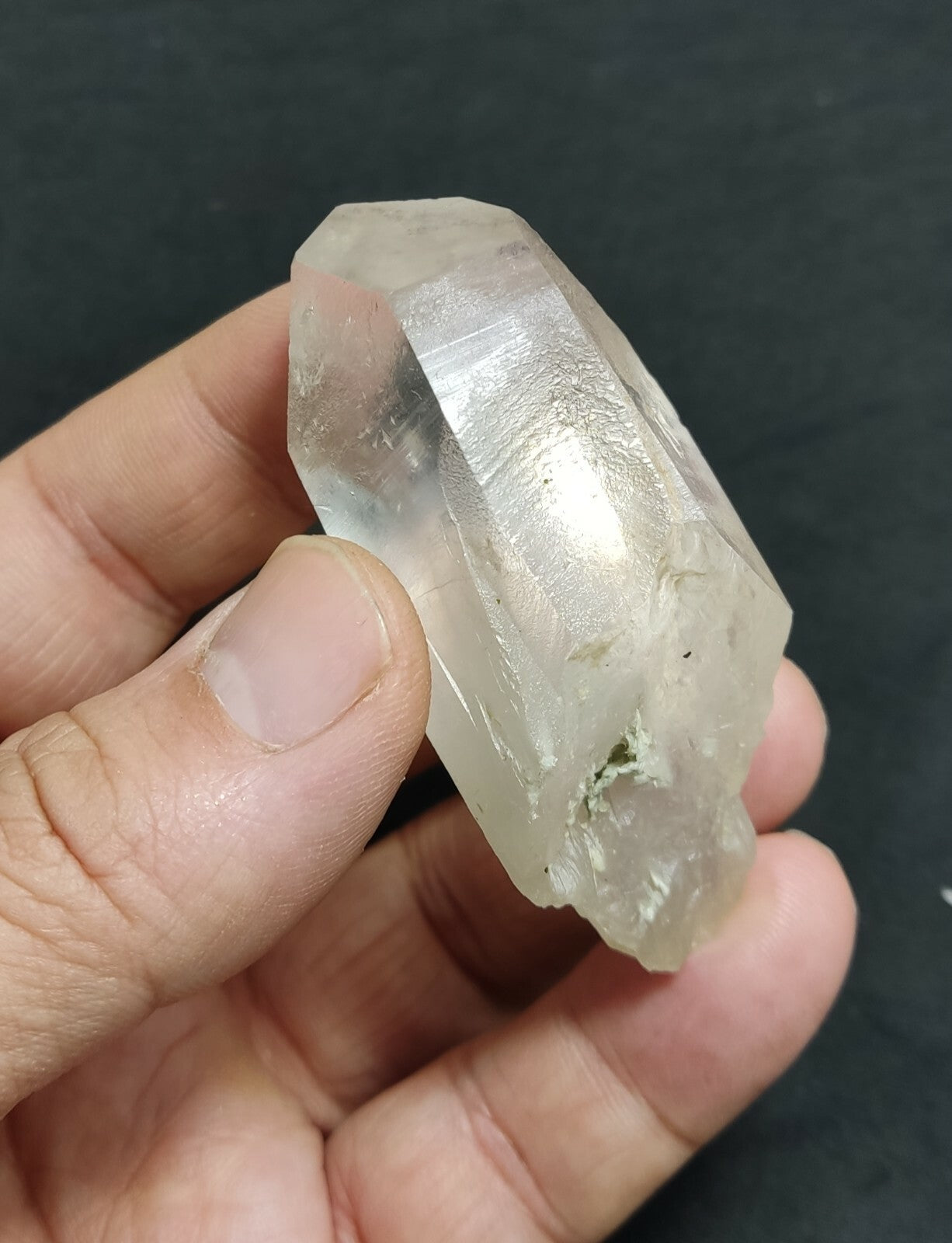 An amazing specimen of terminated Quartz crystal with unique inclusions 67 grams
