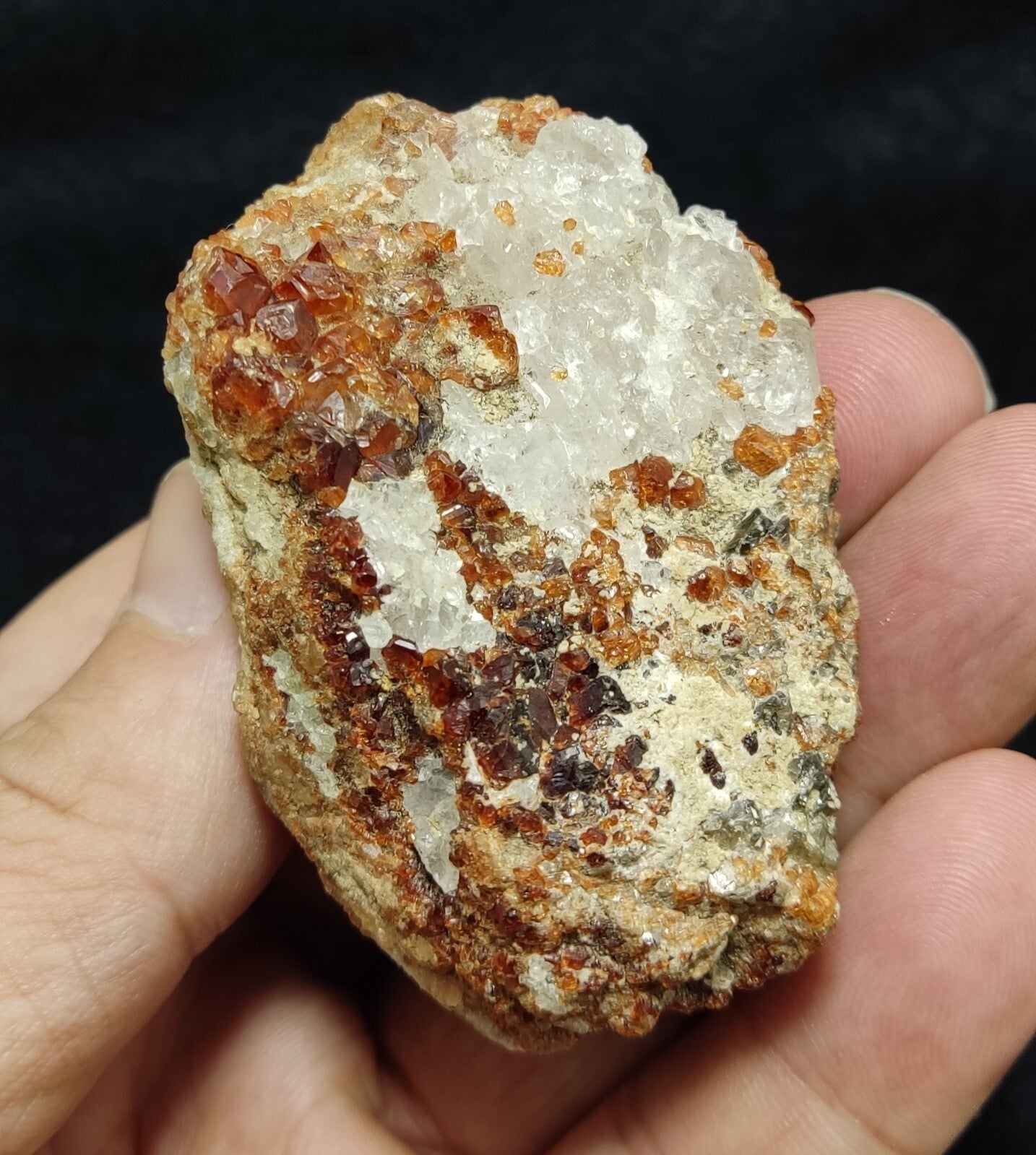 An Aesthetic specimen of hessonite garnets on matrix 132 grams