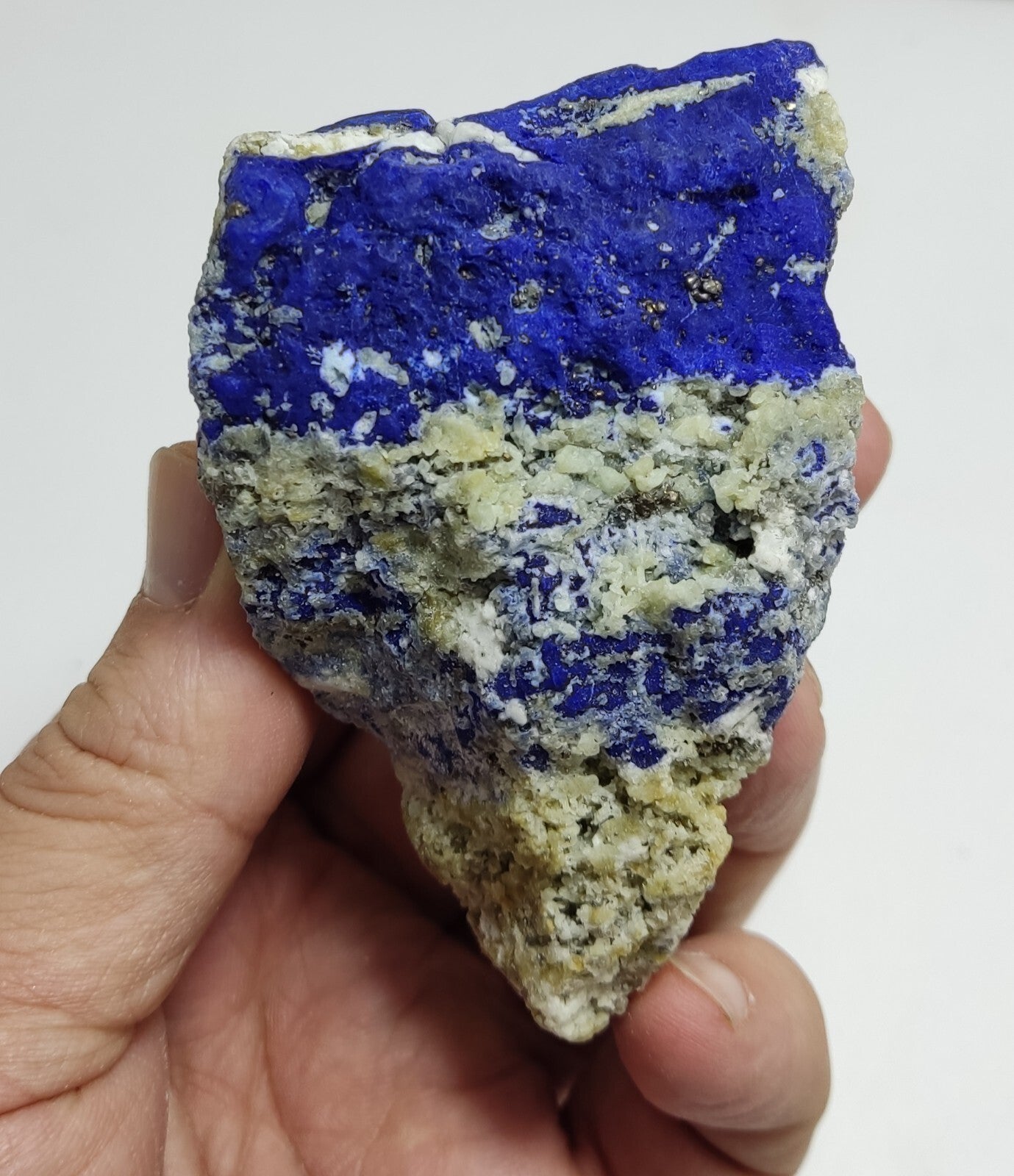 An Aesthetic specimen of fluorescent Lazurite with Pyrite 296 grams