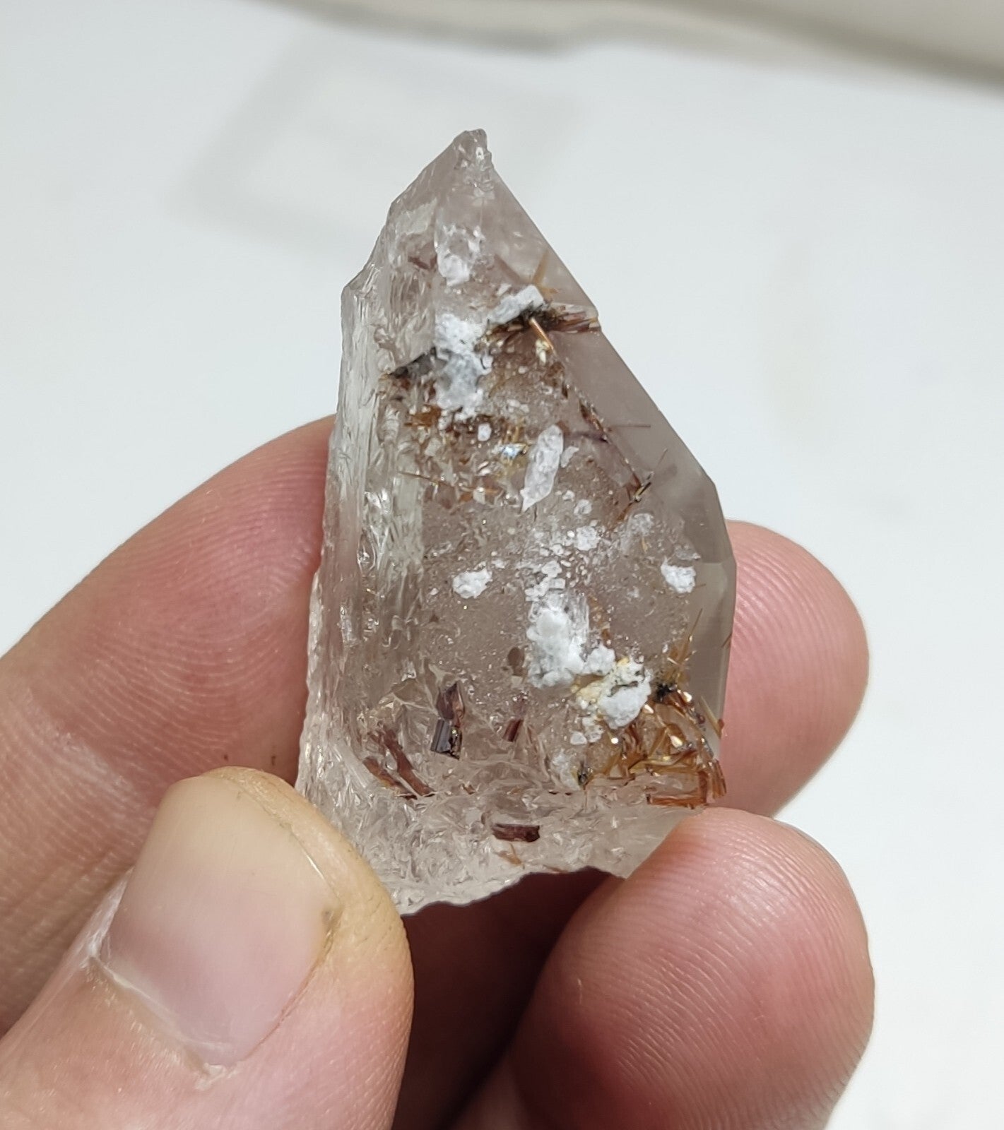 An aesthetic specimen of quartz with rutile inclusions 25 grams