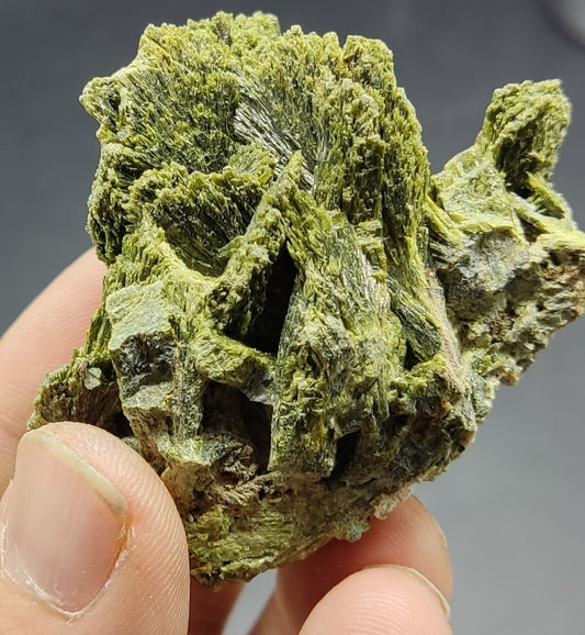 An aesthetic specimen of epidote crystal spray type 107 grams