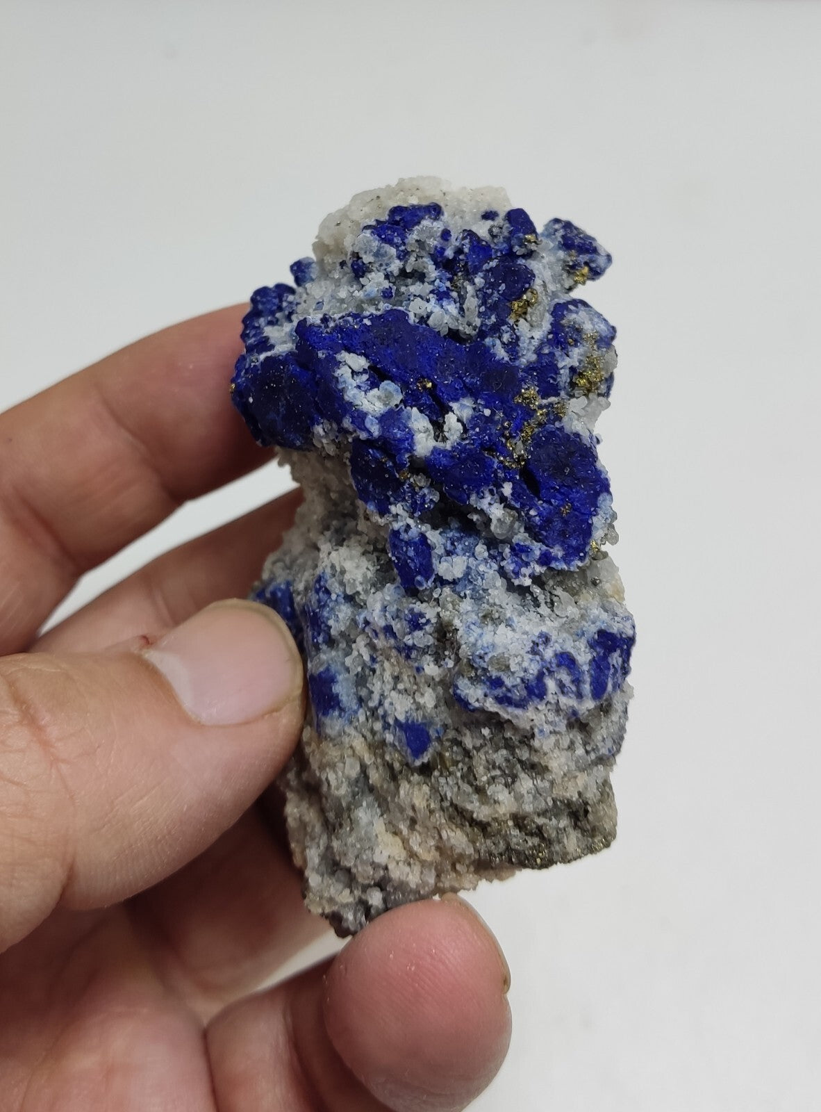 An Aesthetic specimen of fluorescent Lazurite with pyrite 112 grams