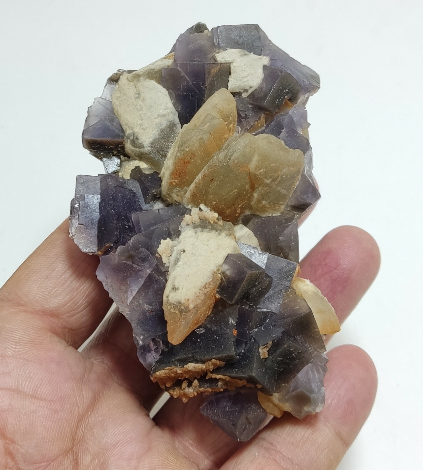 An amazing specimen of cubic purplish color Fluorite with calcite 263 grams