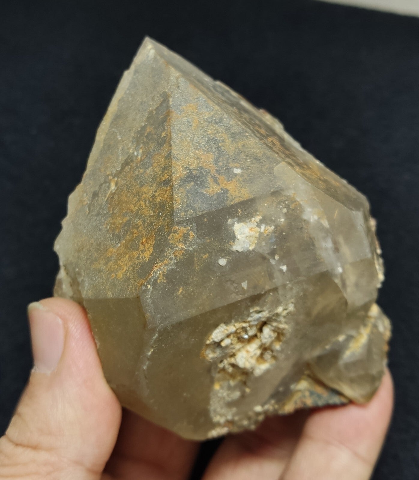 An Aesthetic terminated Quartz floater with rutiles and hematite 399 grams