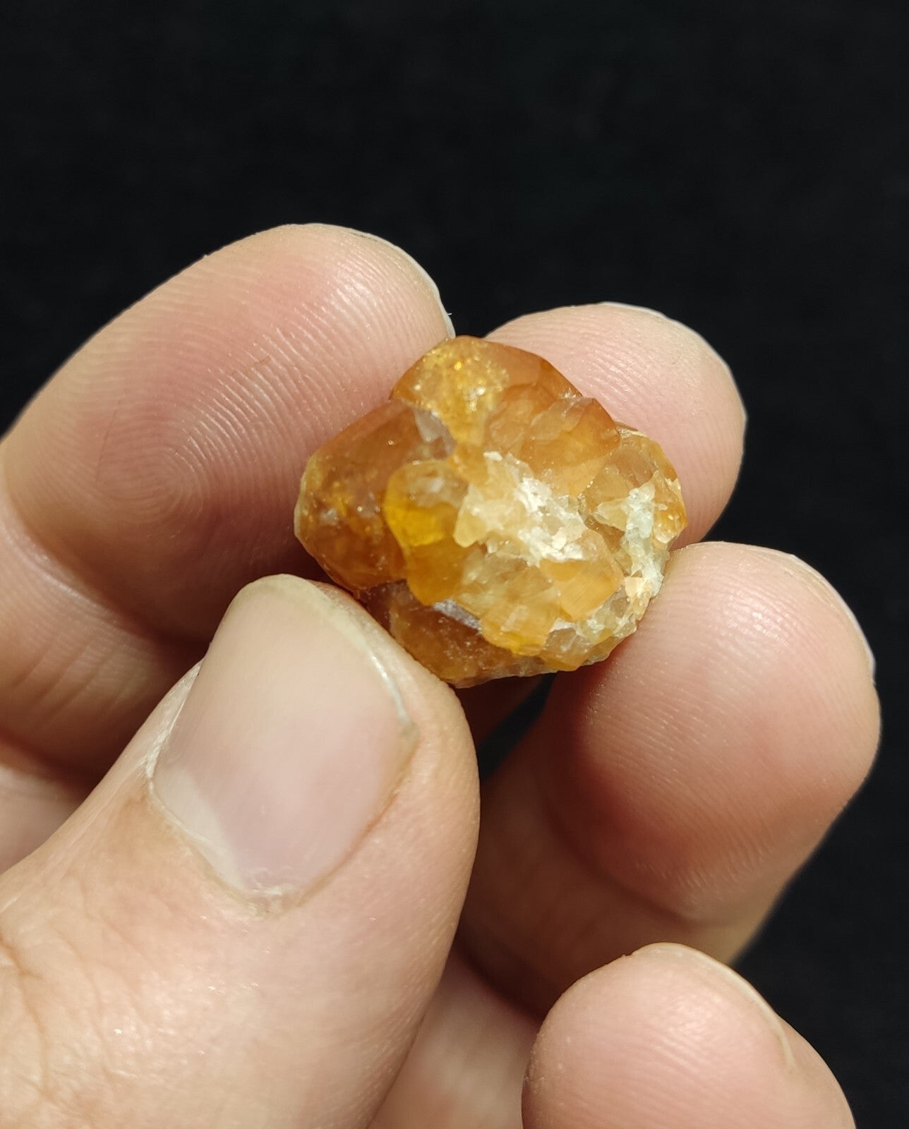 A selection of three garnet variety hessonite crystals 14.8 grams