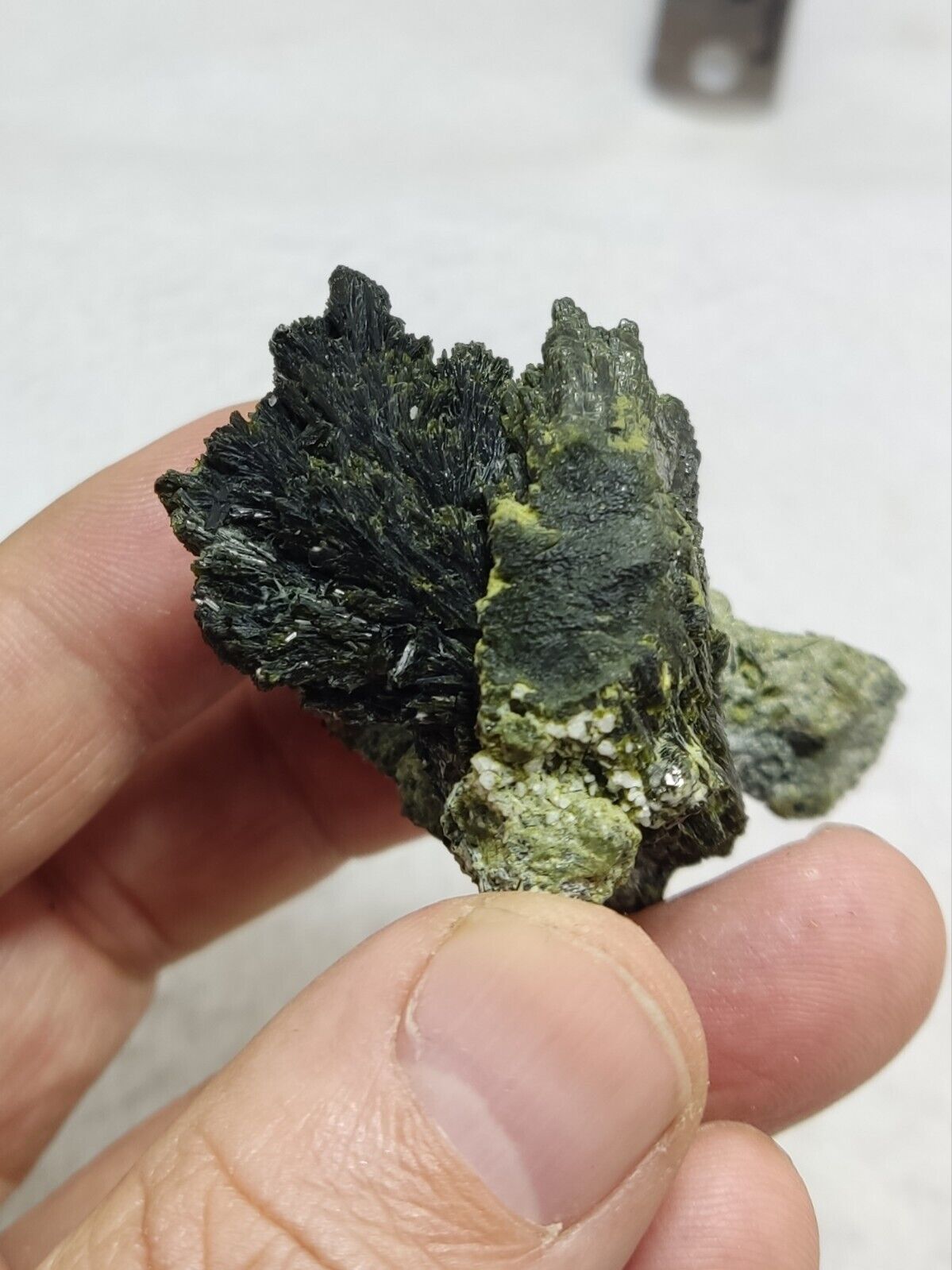 An aesthetic specimen of epidote crystal spray type 66 grams