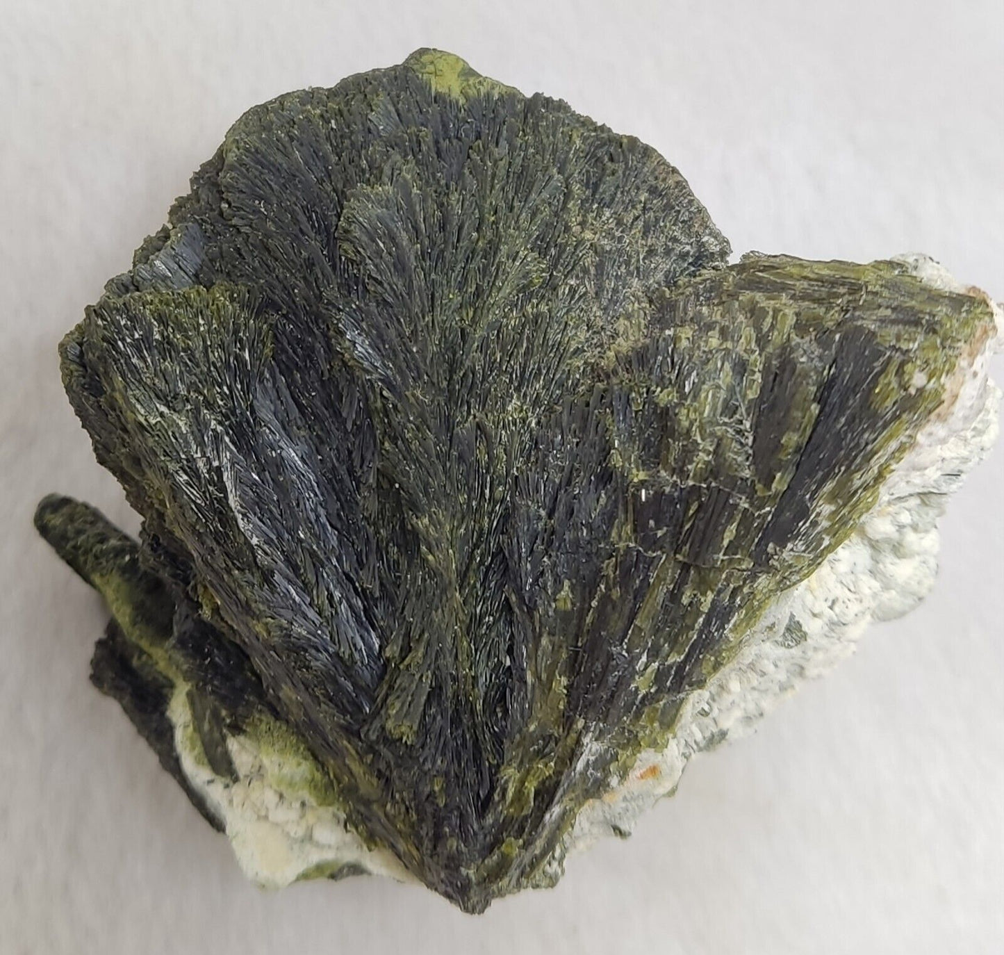 An aesthetic specimen of epidote crystal spray type on matrix 182 grams